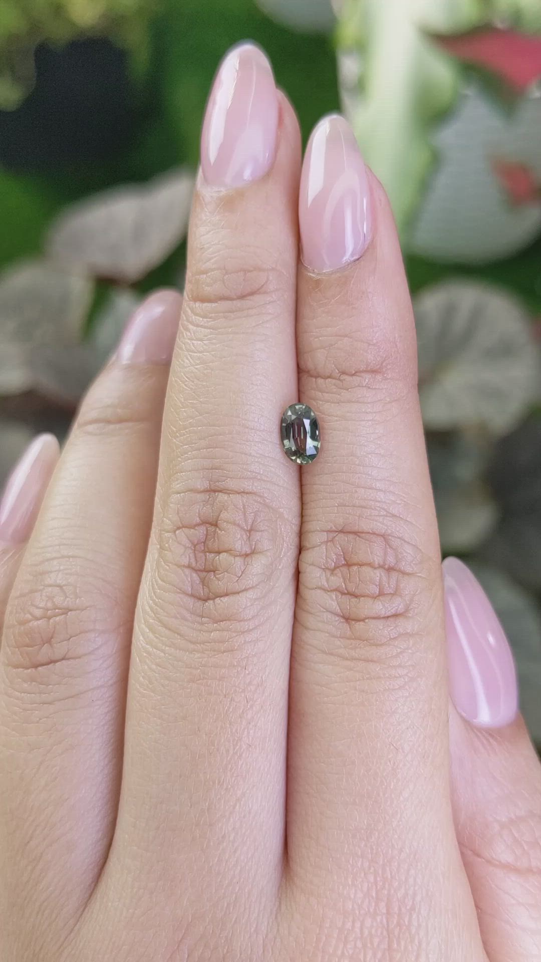 0.70 Ct. Brownish Green Sapphire from Madagascar Size Video