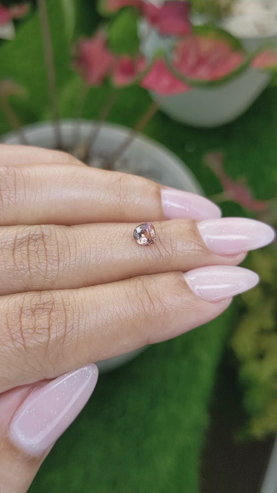 0.62 Ct. Peach Sapphire from Madagascar Size Video