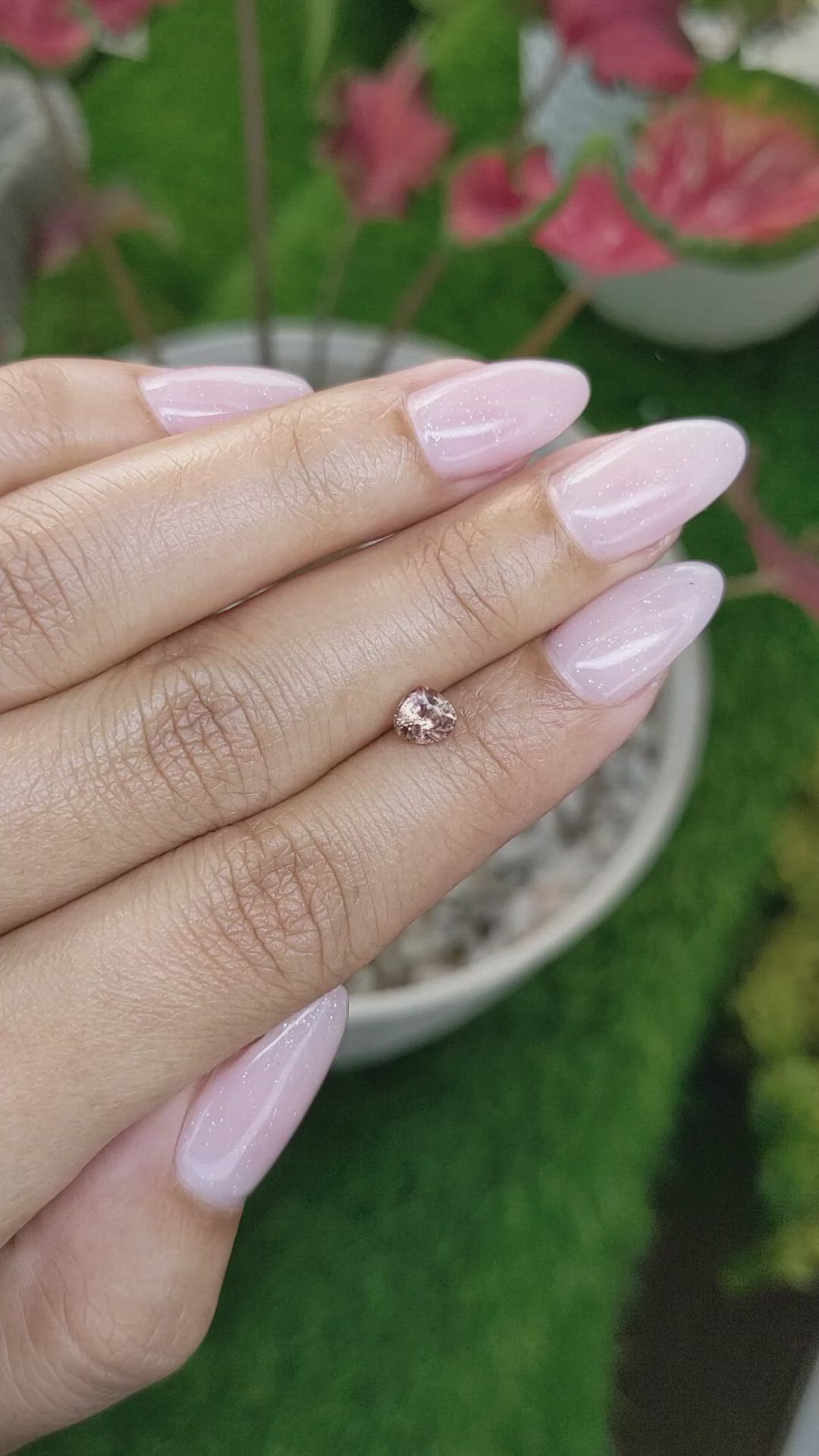 0.62 Ct. Peach Sapphire from Madagascar Size Video