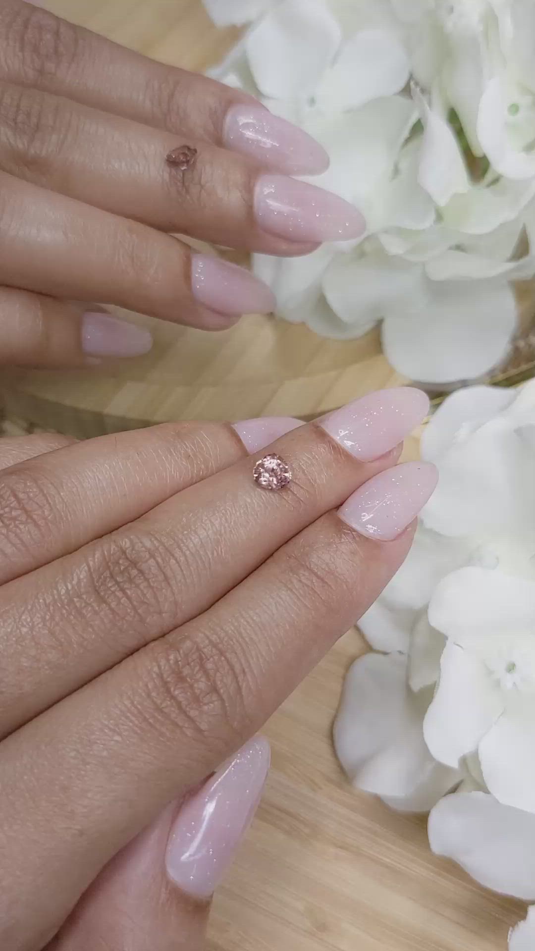 0.62 Ct. Peach Sapphire from Madagascar Size Video