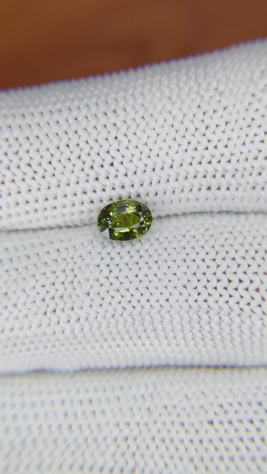 0.79 Ct. Yellowish Green Sapphire from Madagascar Size Video