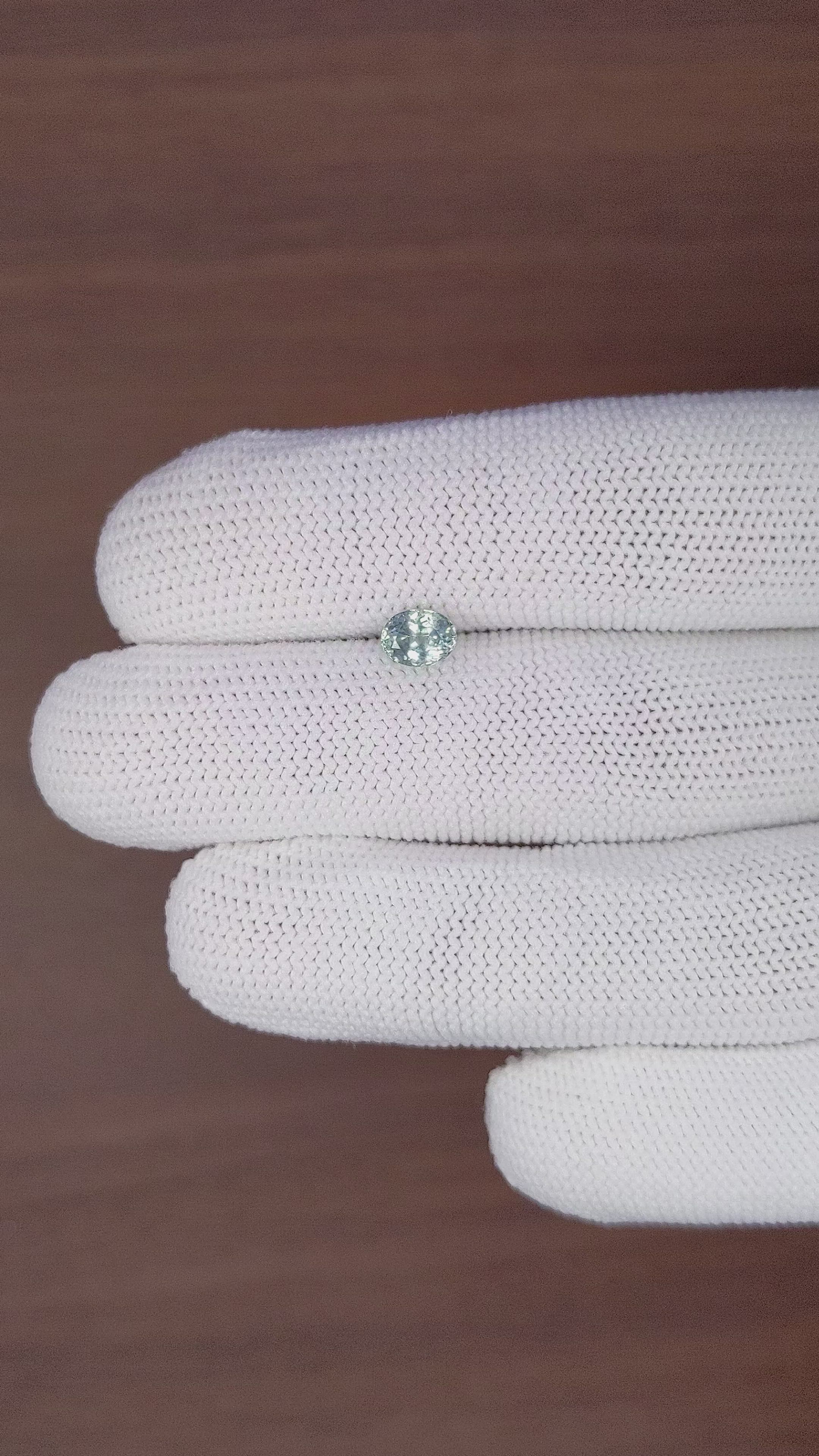 0.94 Ct. Bluish Green Sapphire from Montana Size Video
