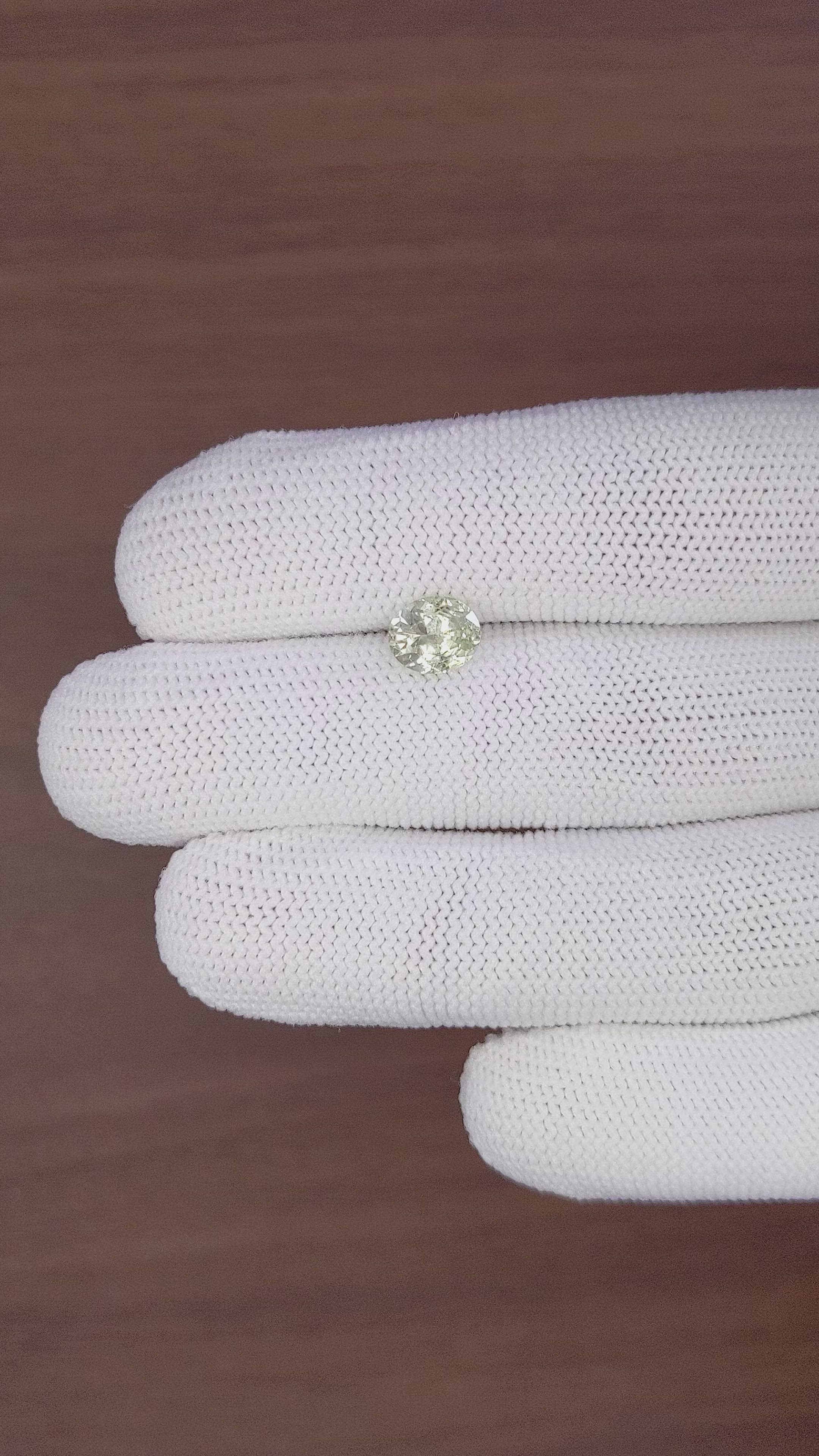 1.56 Ct. Yellowish Green Sapphire from Montana Size Video