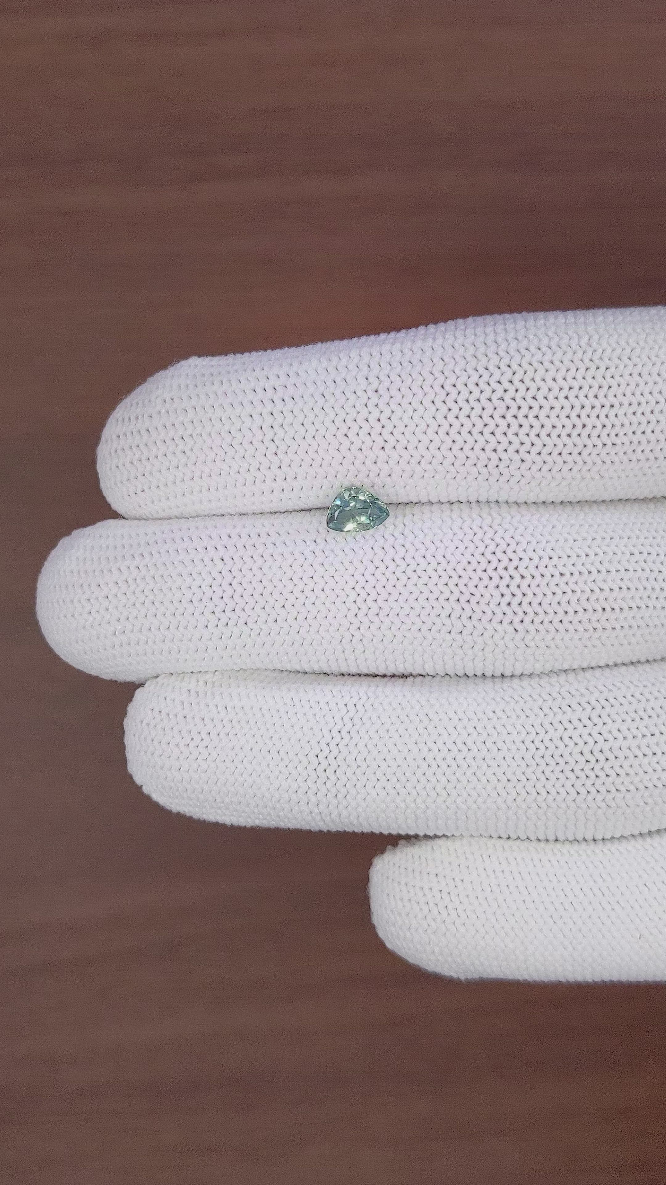 0.87 Ct. Bluish Green Sapphire from Montana Size Video
