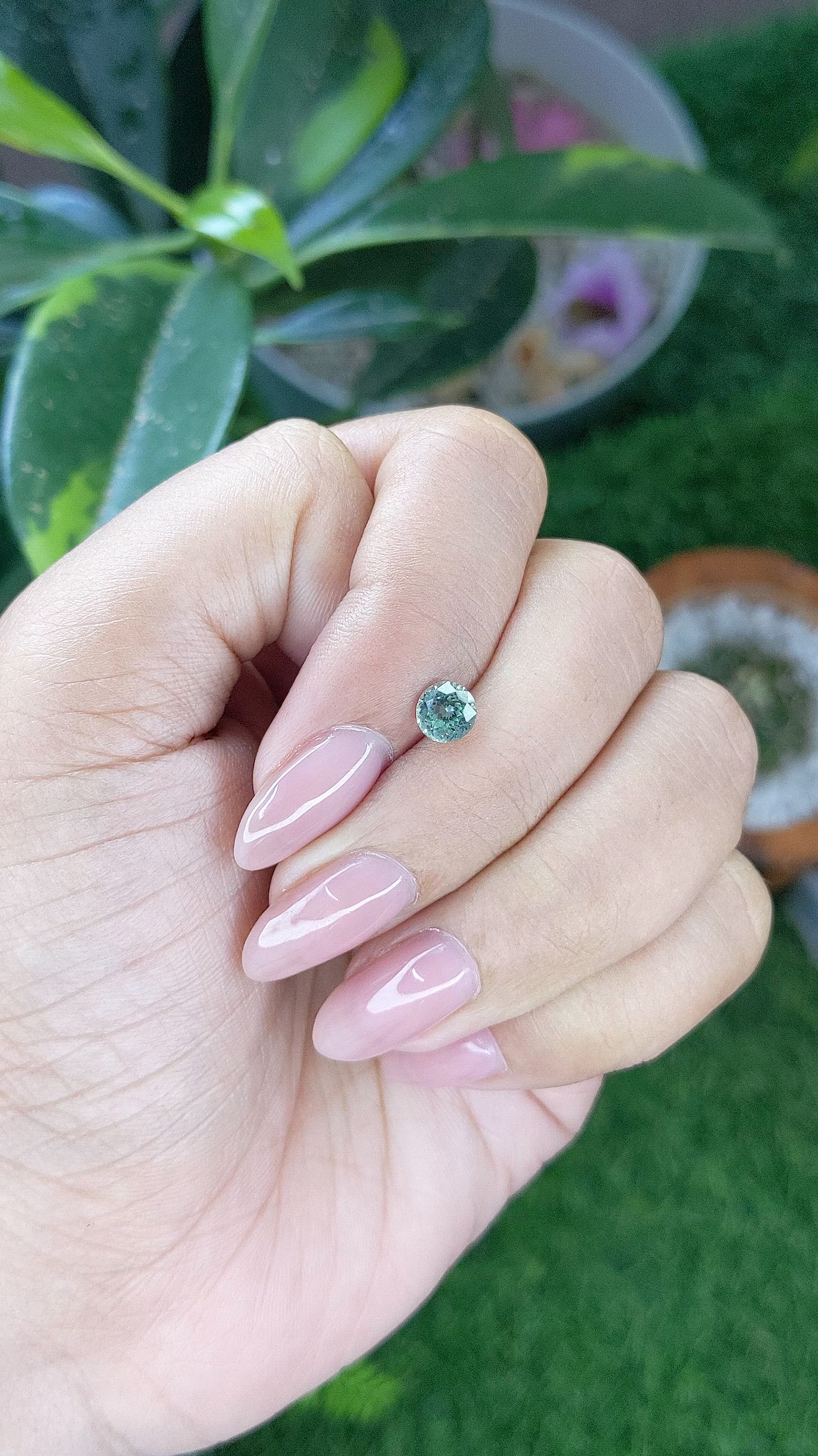 0.75 Ct. Bluish Green Sapphire from Montana Size Video