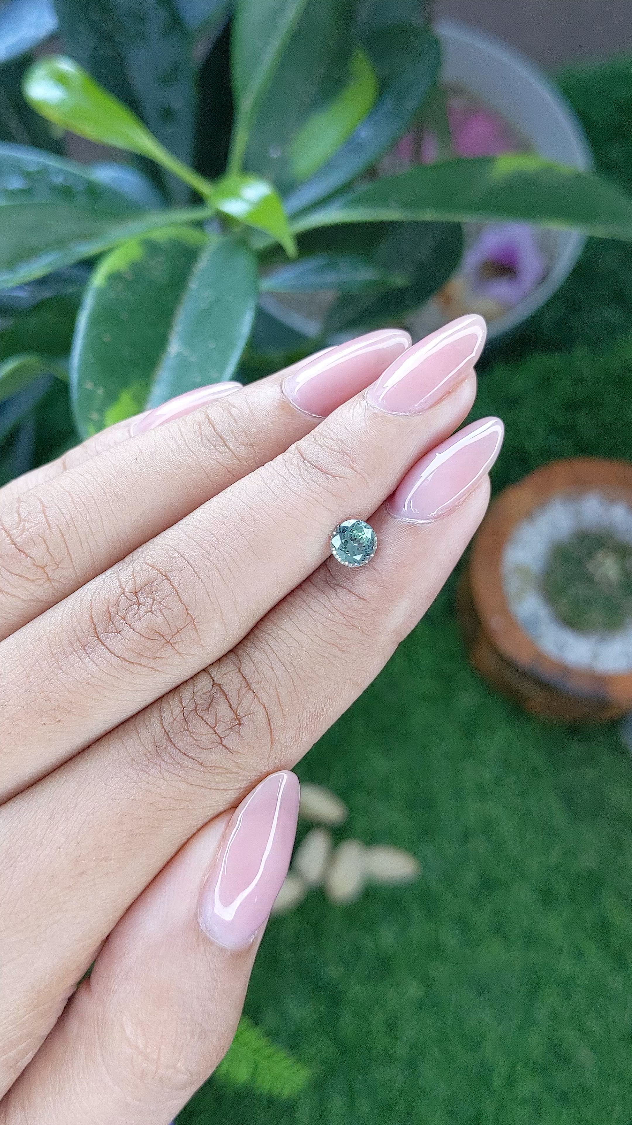 0.75 Ct. Bluish Green Sapphire from Montana Size Video