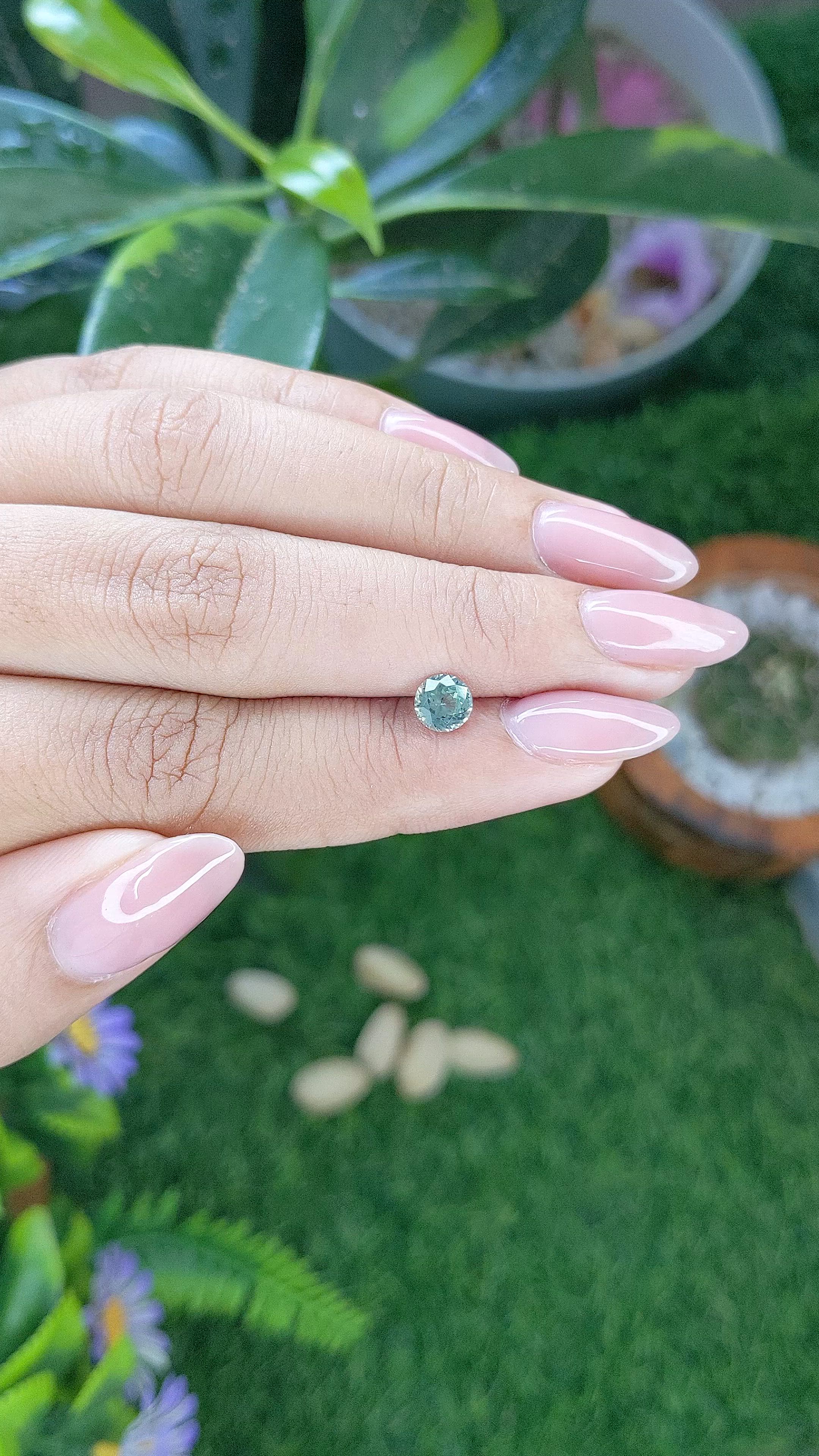 0.75 Ct. Bluish Green Sapphire from Montana Size Video