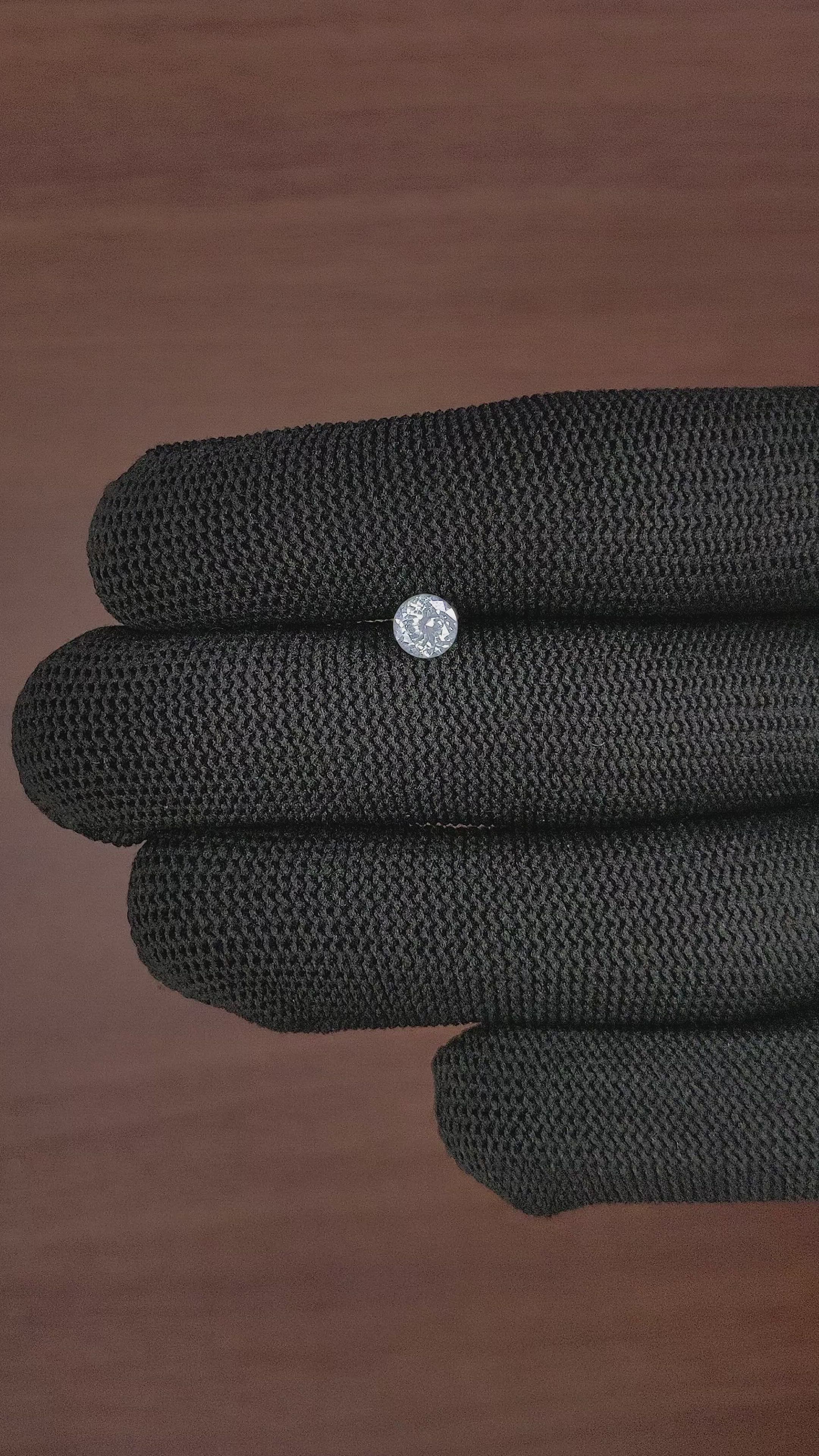 0.71 Ct. White Sapphire from Montana Size Video