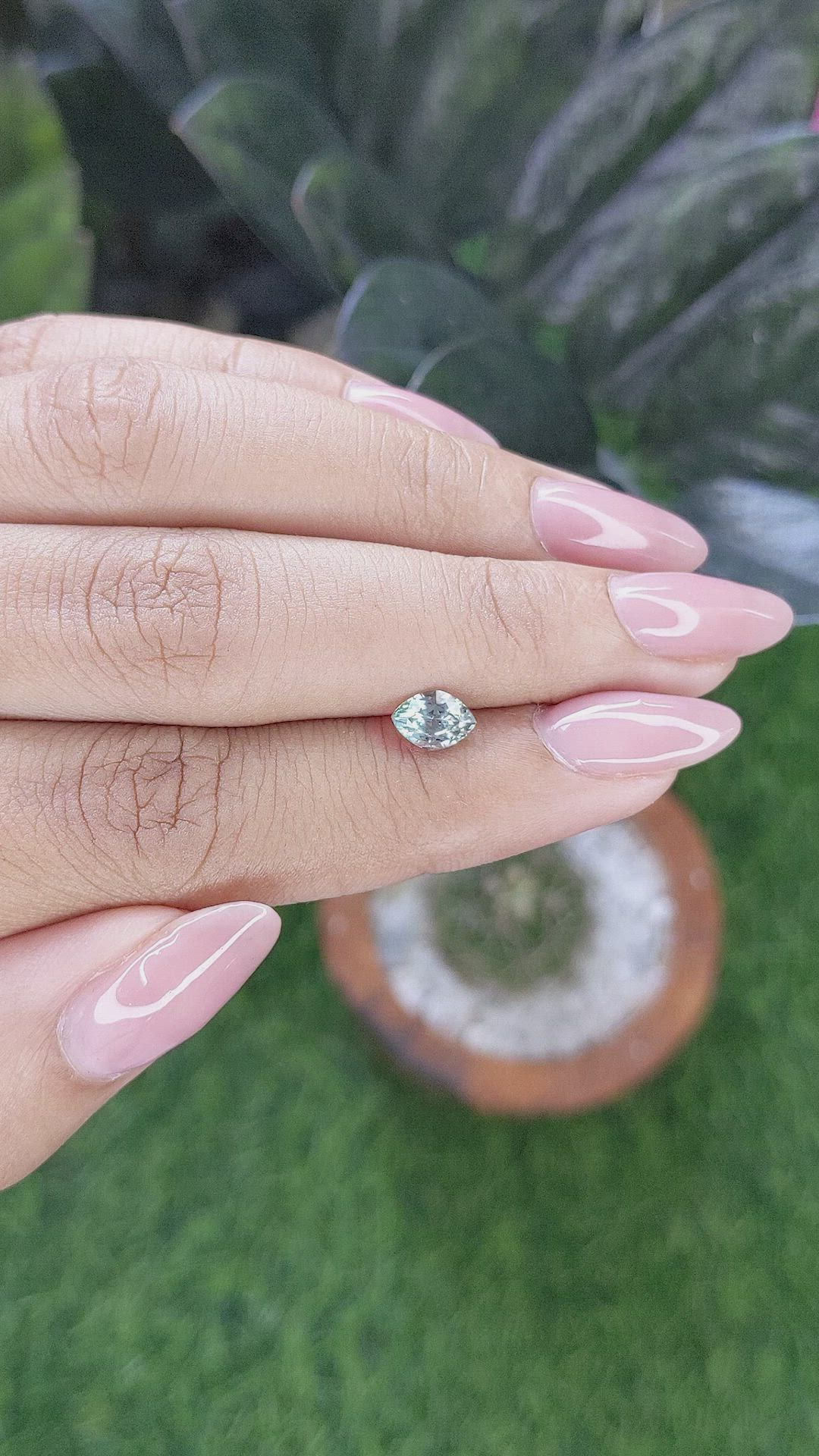 0.82 Ct. Bluish Green Sapphire from Montana Size Video