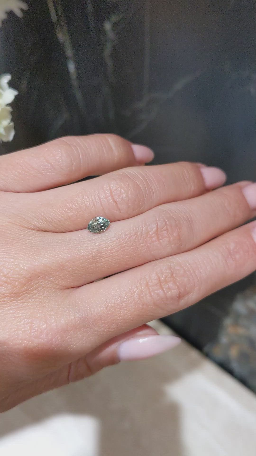 0.82 Ct. Bluish Green Sapphire from Montana Size Video