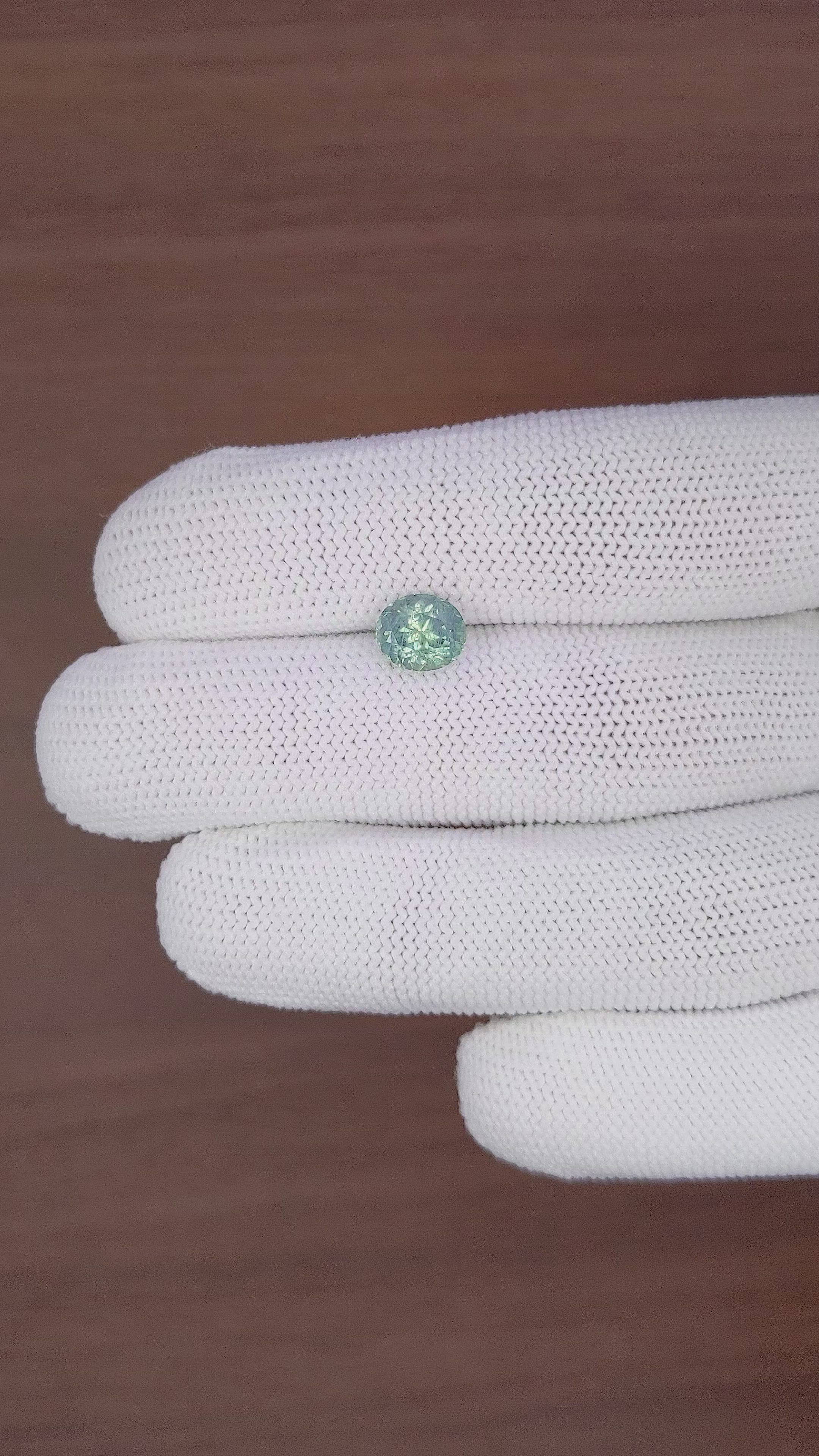 1.97 Ct. Bluish Green Sapphire from Montana Size Video