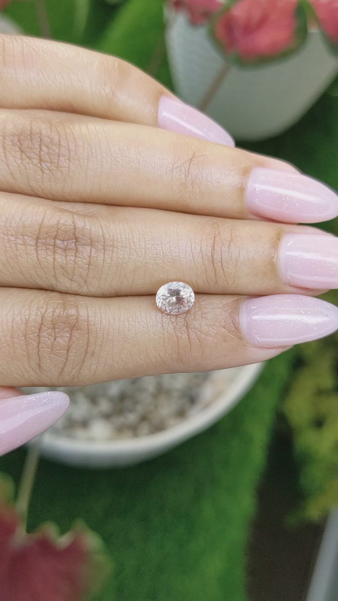 0.97 Ct. Peach Sapphire from Ceylon (Sri Lanka) Size Video