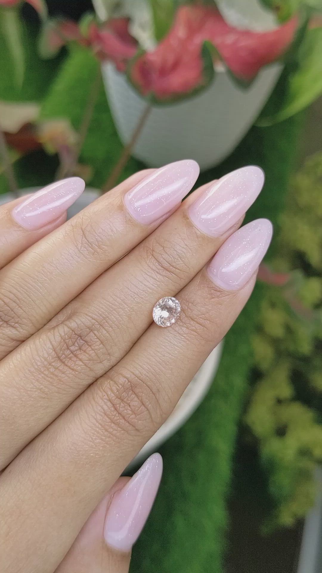 0.97 Ct. Peach Sapphire from Ceylon (Sri Lanka) Size Video