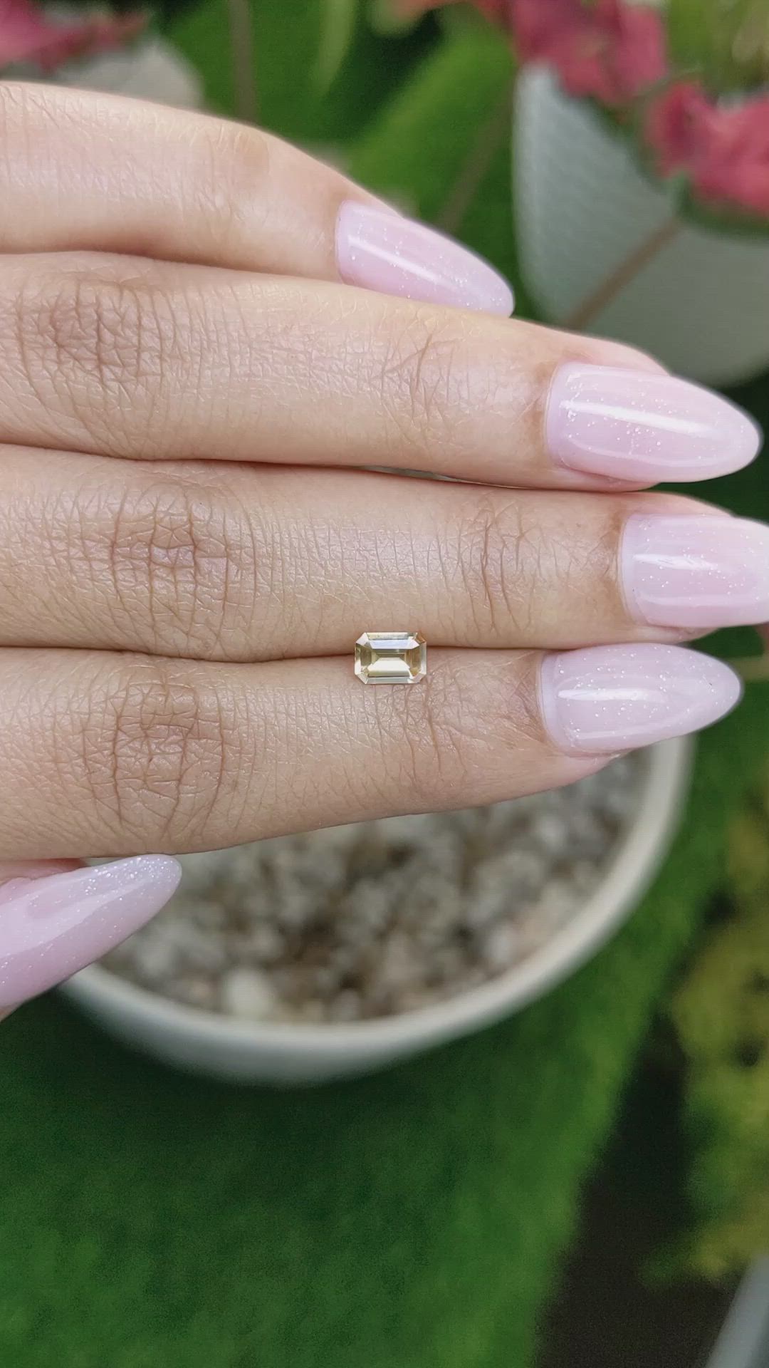 0.54 Ct. Peach Sapphire from Ceylon (Sri Lanka) Size Video