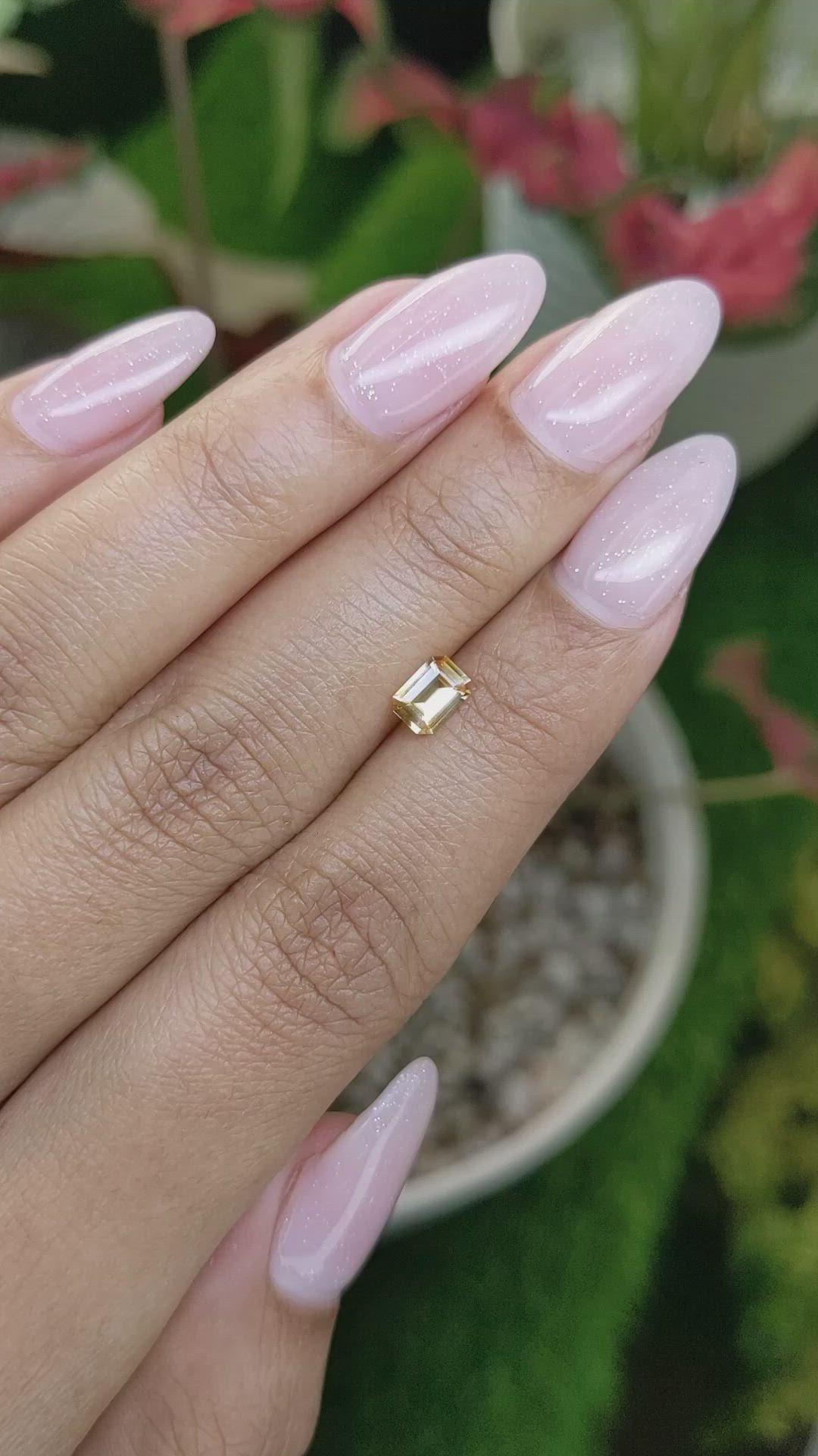 0.54 Ct. Peach Sapphire from Ceylon (Sri Lanka) Size Video