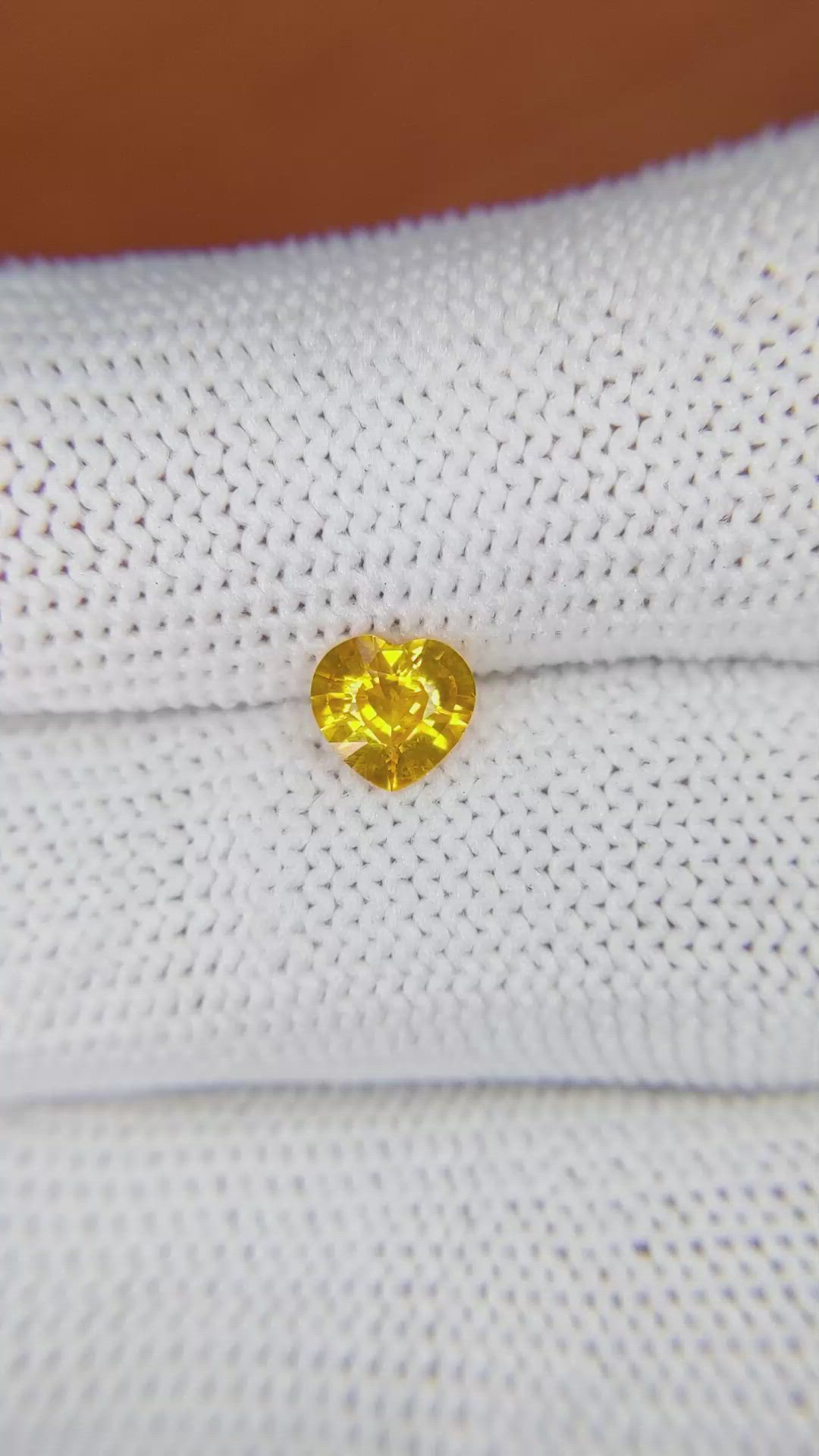 0.74 Ct. Orangish Yellow Sapphire from Ceylon (Sri Lanka) Size Video