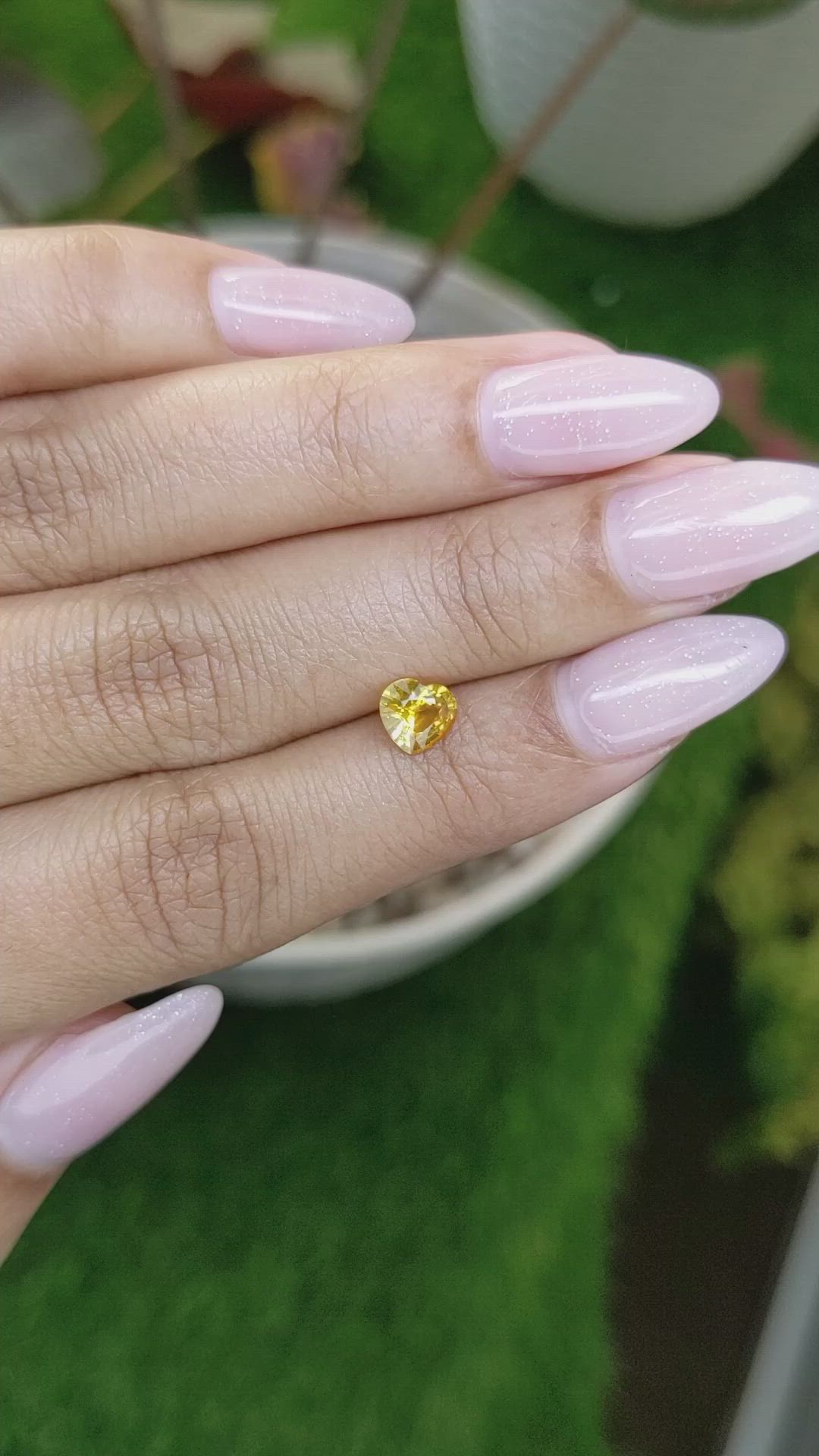 0.74 Ct. Orangish Yellow Sapphire from Ceylon (Sri Lanka) Size Video