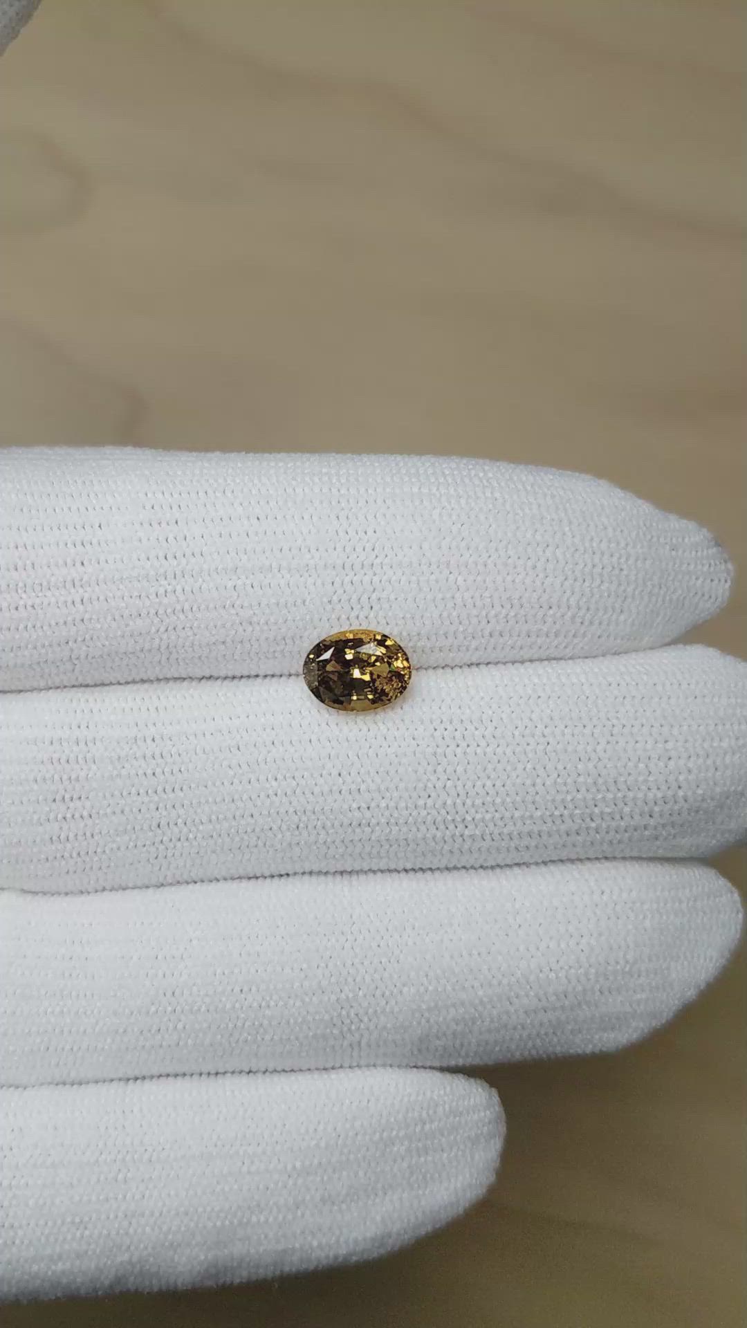 2.10 Ct. Yellowish Brown Sapphire from Ceylon (Sri Lanka) Size Video
