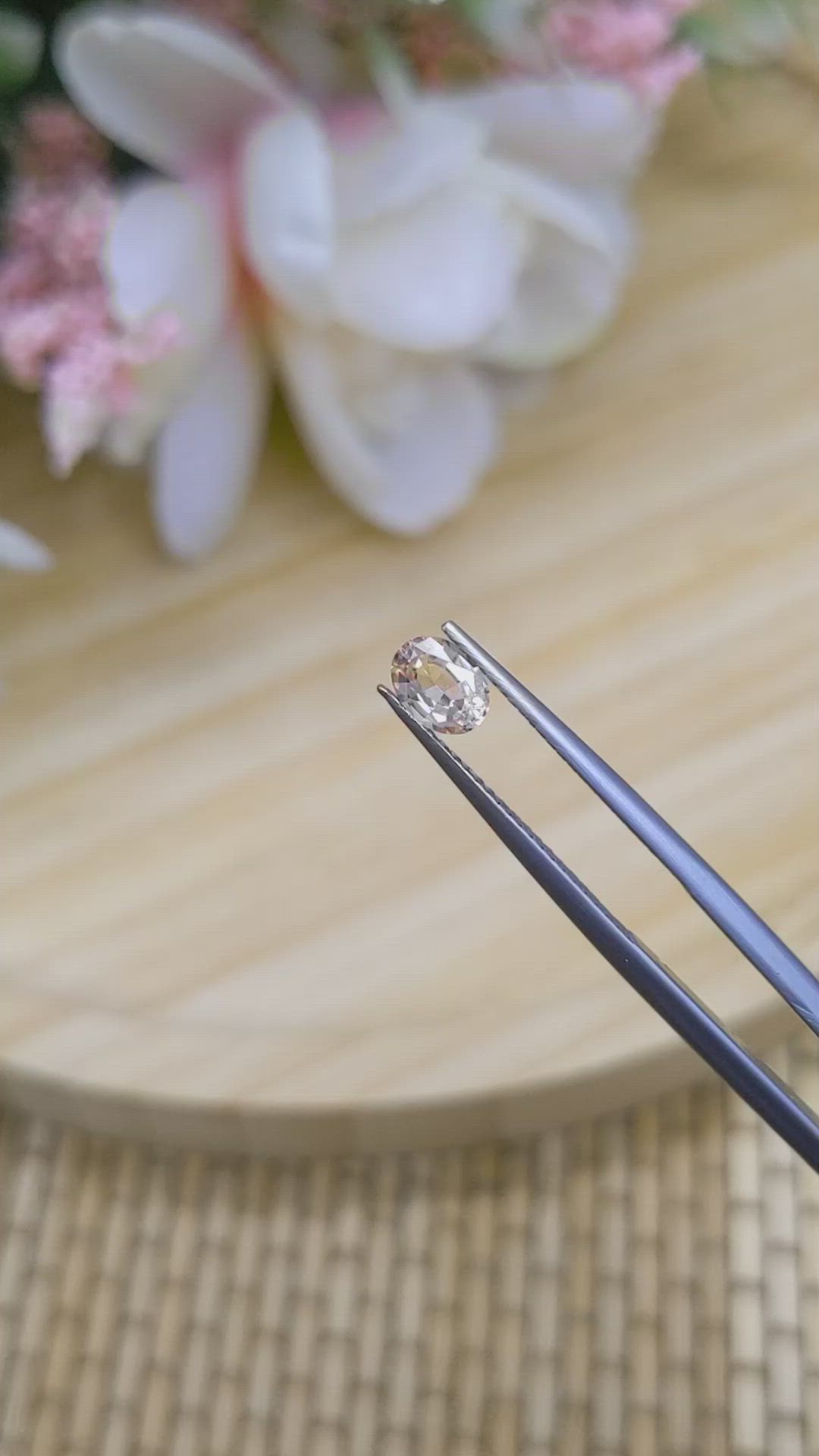 0.57 Ct. Peach Sapphire from Ceylon (Sri Lanka) Size Video