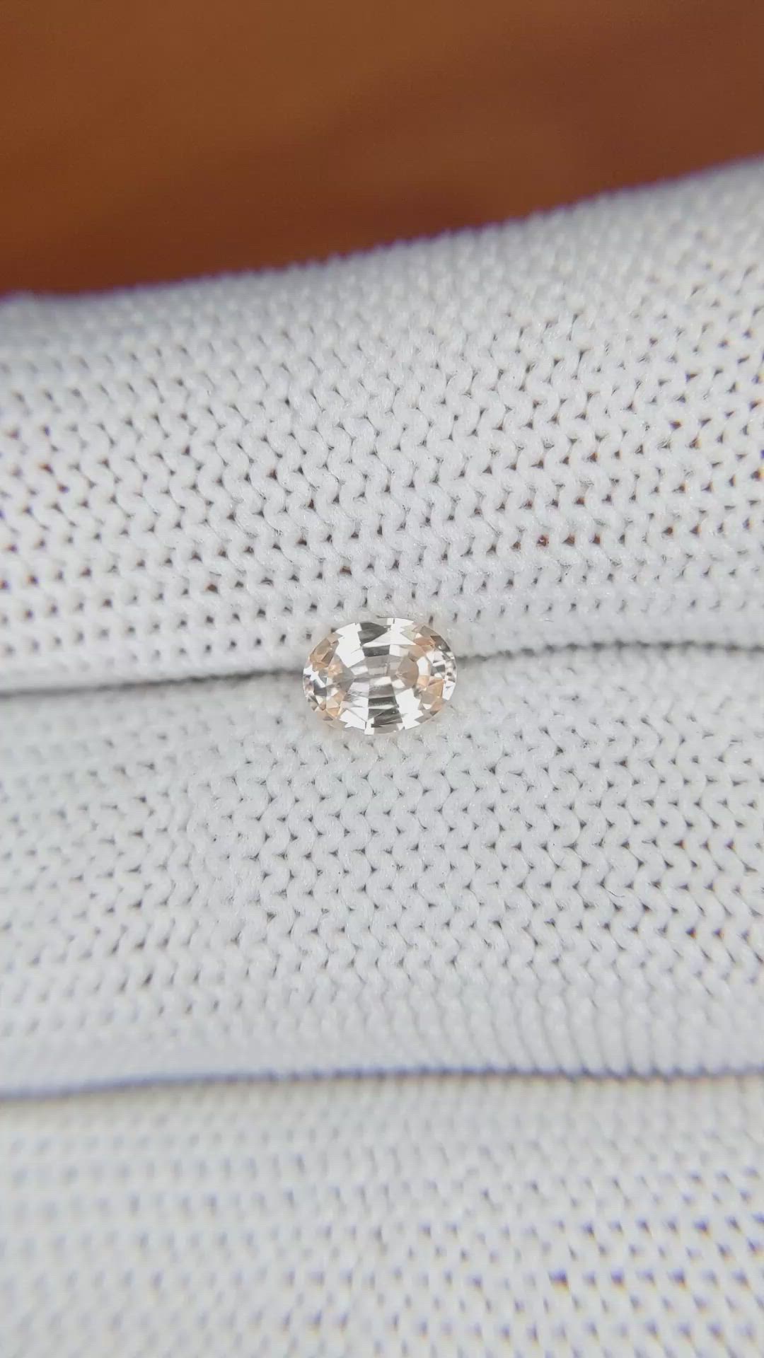 0.57 Ct. Peach Sapphire from Ceylon (Sri Lanka) Size Video