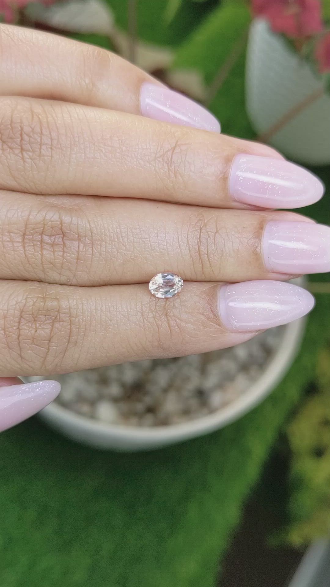 0.57 Ct. Peach Sapphire from Ceylon (Sri Lanka) Size Video