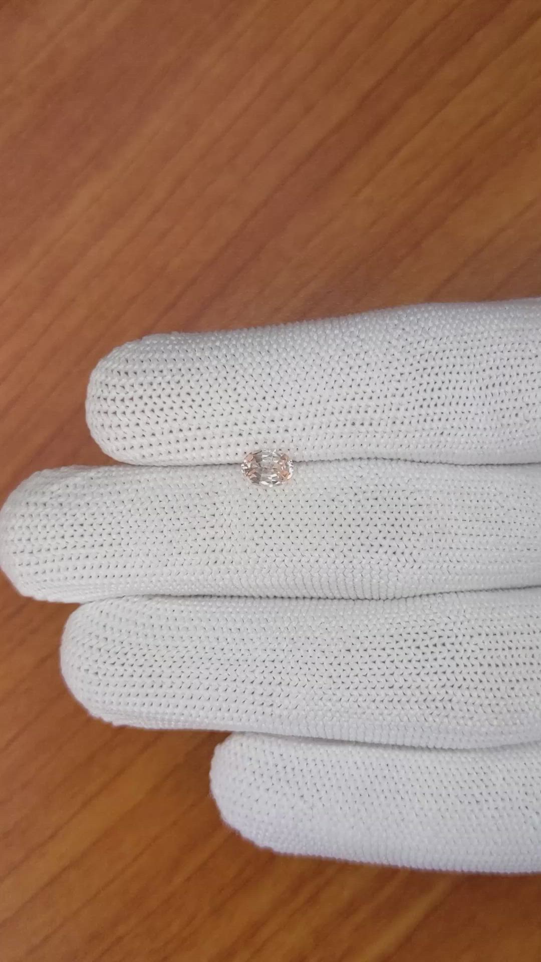 0.57 Ct. Peach Sapphire from Ceylon (Sri Lanka) Size Video
