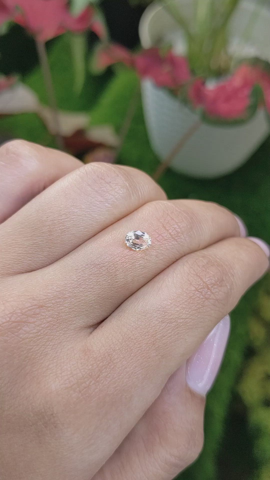 0.57 Ct. Peach Sapphire from Ceylon (Sri Lanka) Size Video