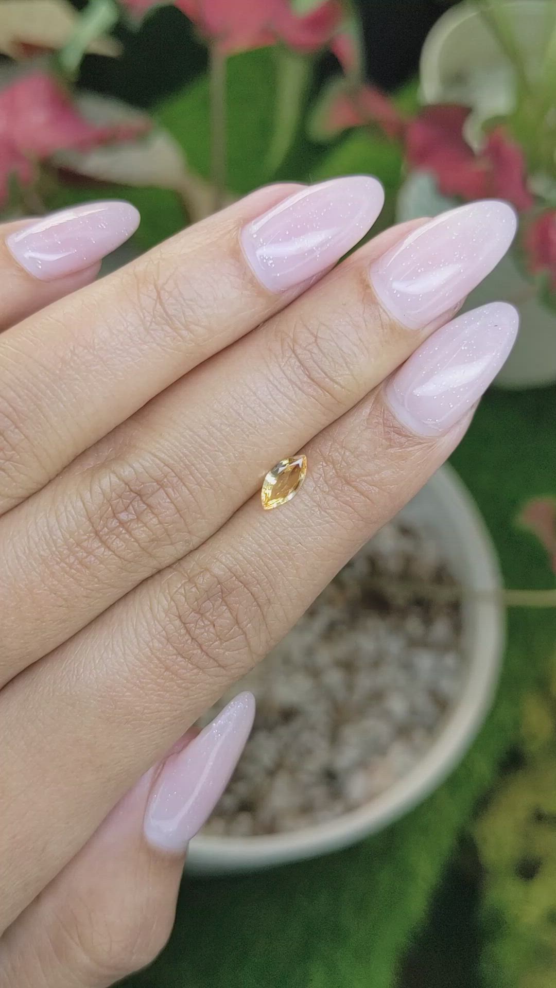 0.44 Ct. Orangish Yellow Sapphire from Ceylon (Sri Lanka) Size Video