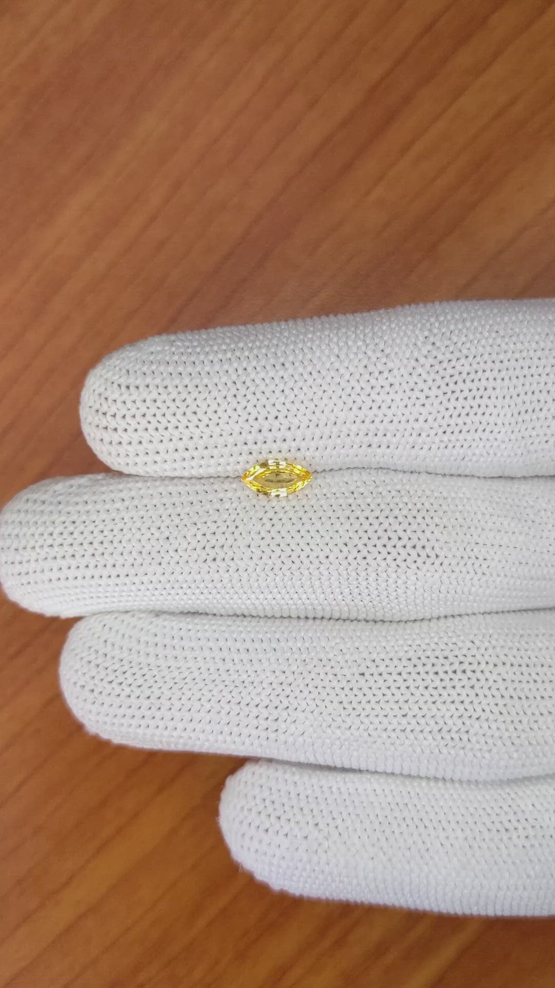 0.44 Ct. Orangish Yellow Sapphire from Ceylon (Sri Lanka) Size Video