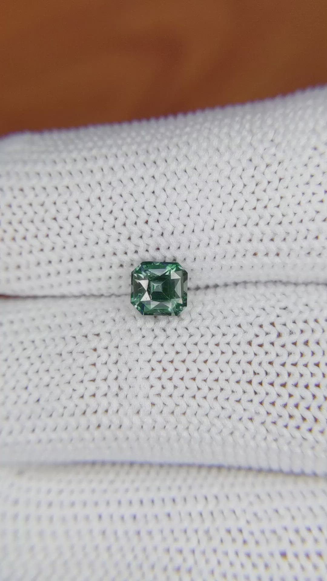 0.91 Ct. Bluish Green Sapphire from Madagascar Size Video