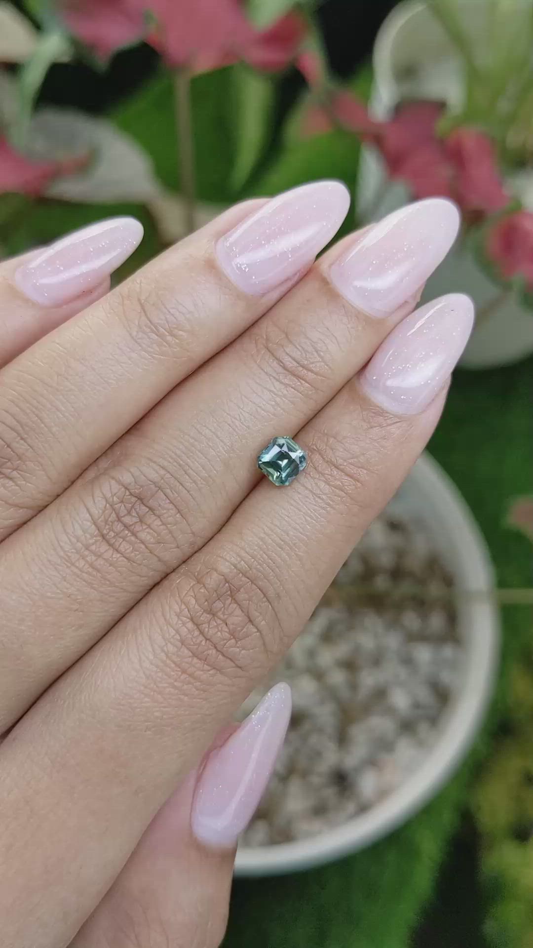 0.91 Ct. Bluish Green Sapphire from Madagascar Size Video