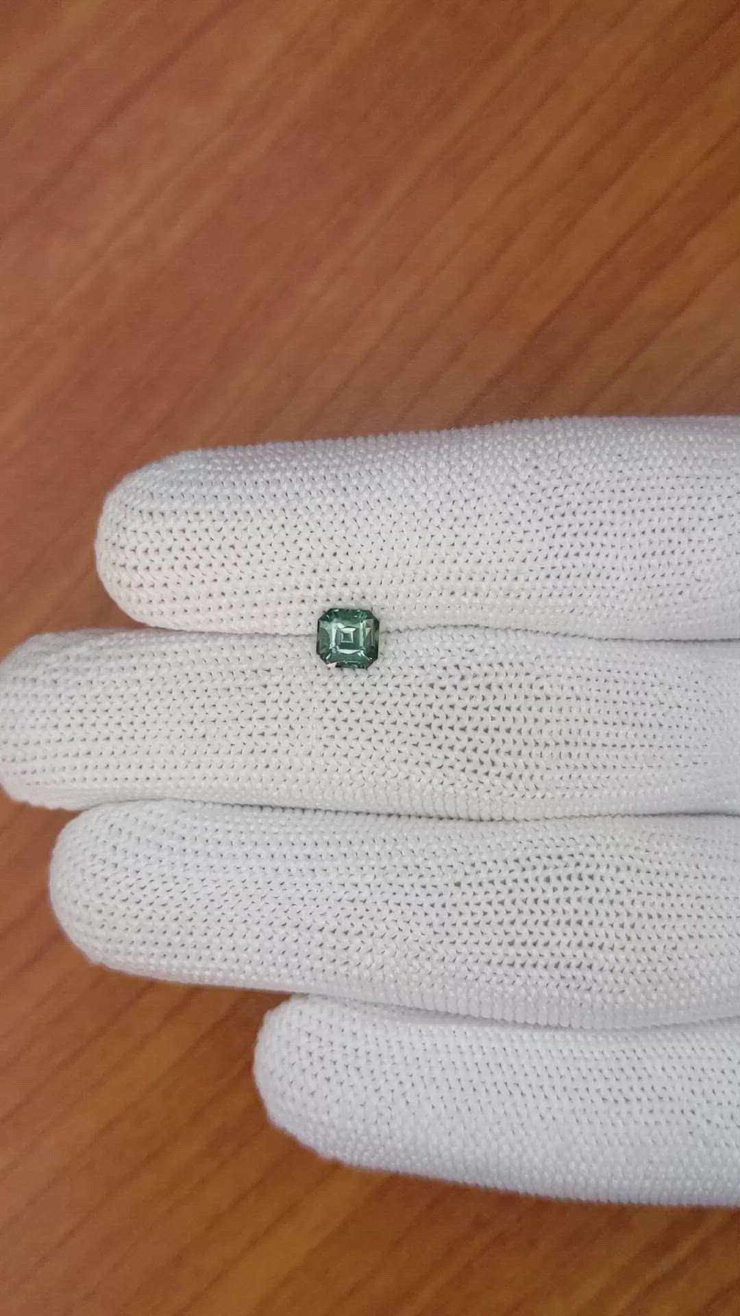 0.91 Ct. Bluish Green Sapphire from Madagascar Size Video