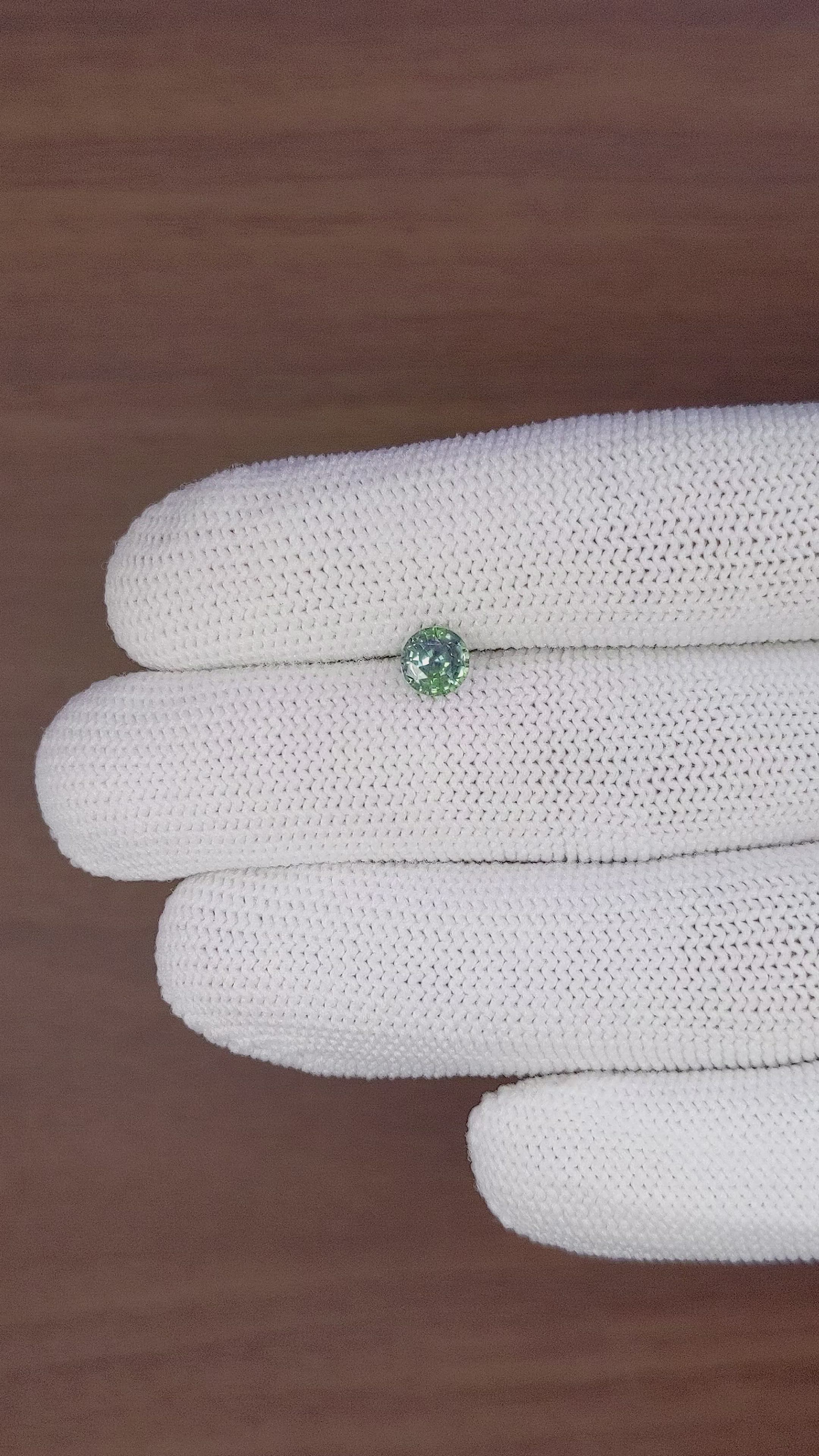 0.91 Ct. Bluish Green Sapphire from Madagascar Size Video