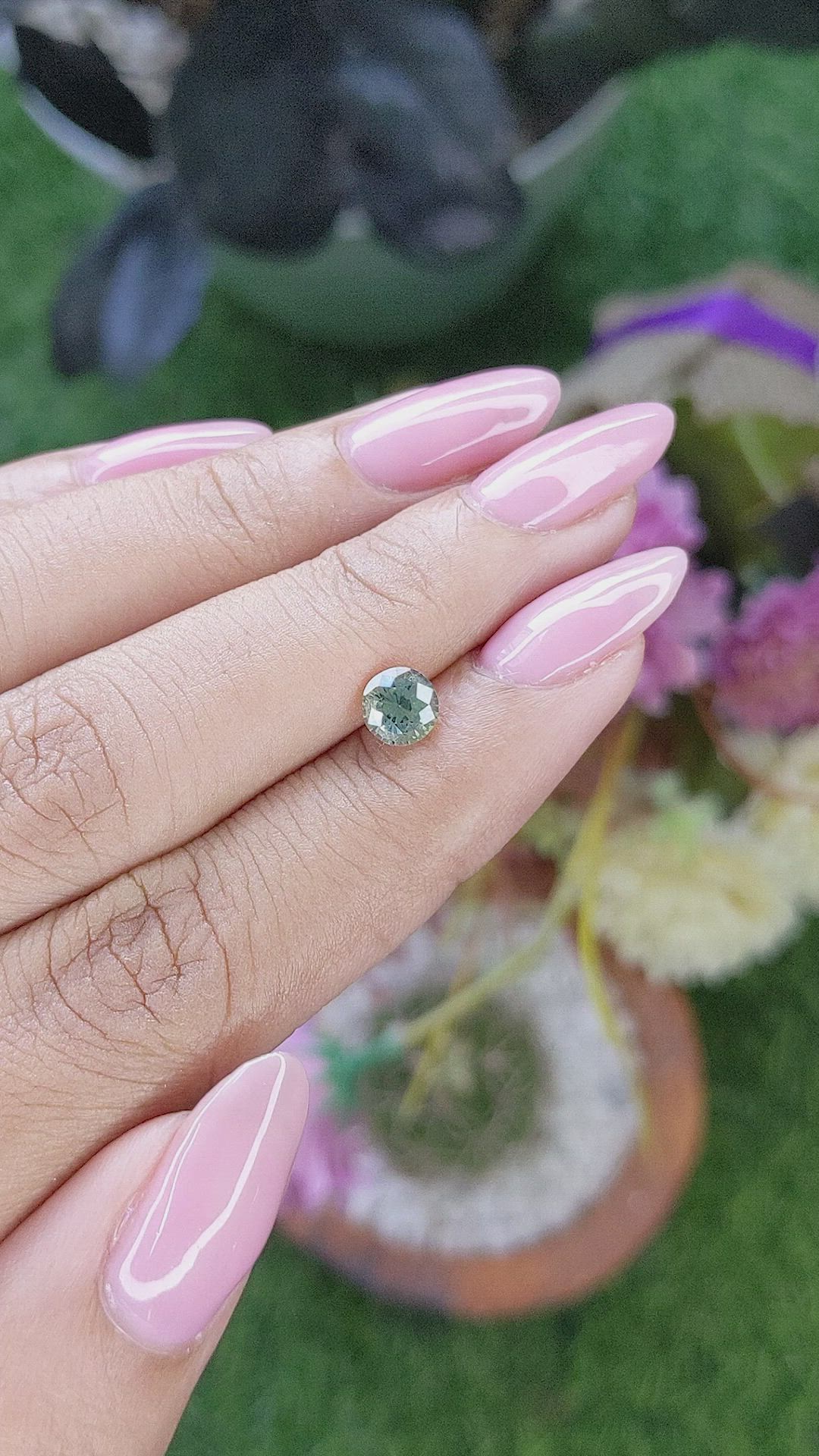 0.91 Ct. Bluish Green Sapphire from Madagascar Size Video