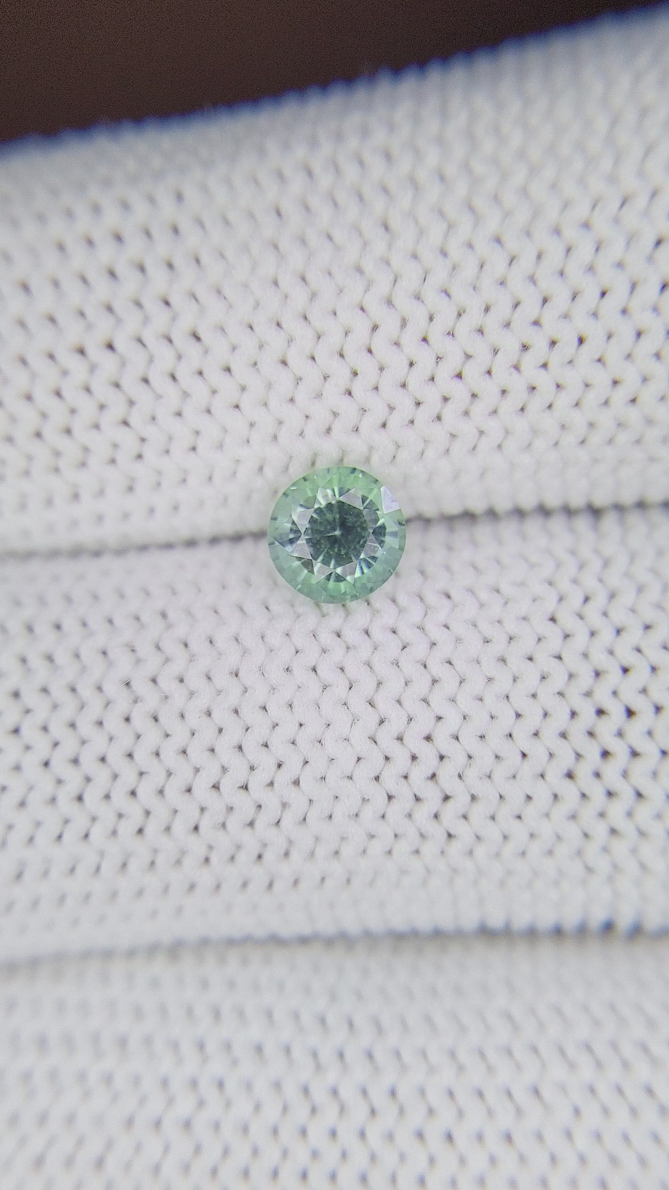 0.91 Ct. Bluish Green Sapphire from Madagascar Size Video