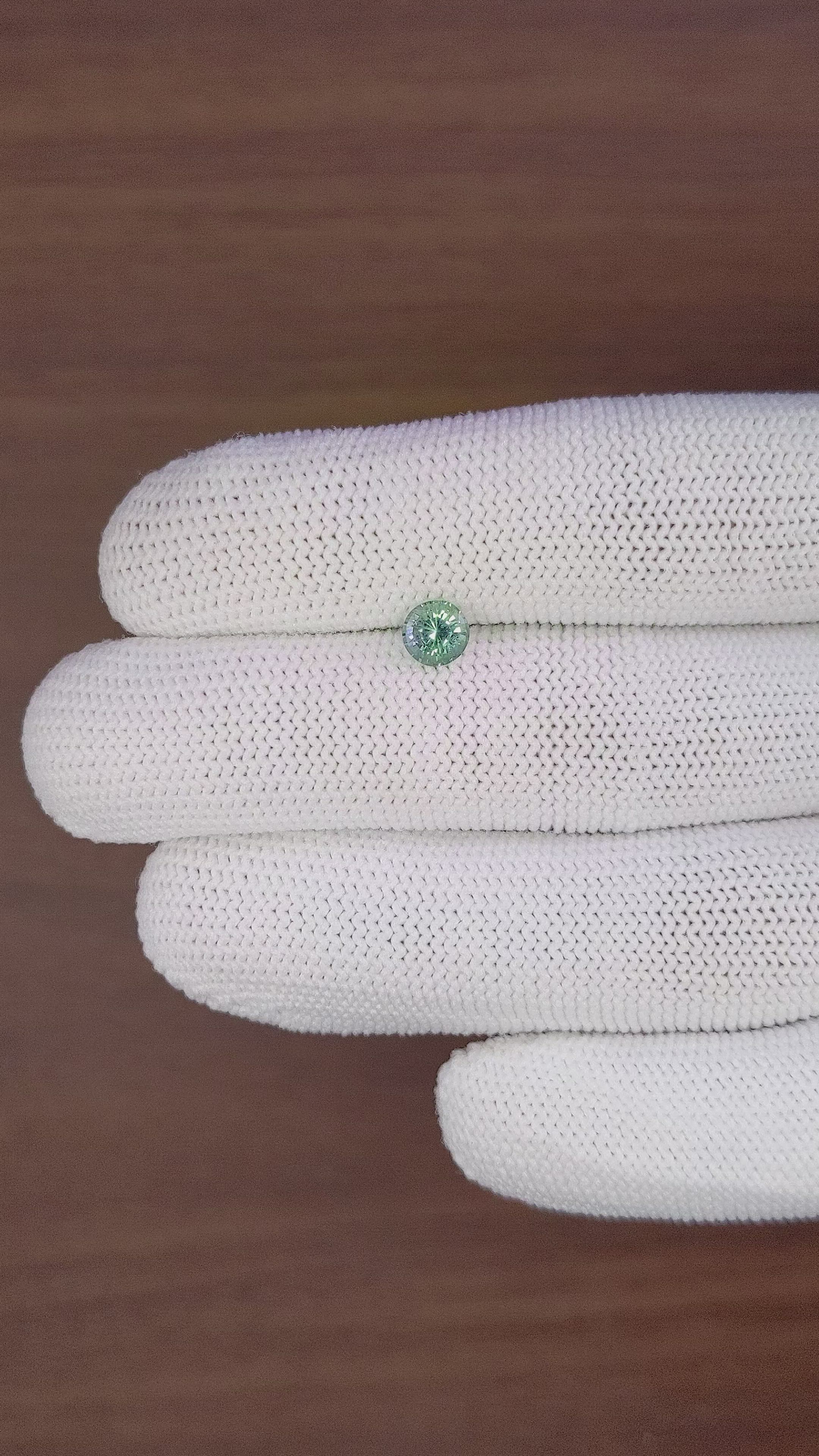 0.91 Ct. Bluish Green Sapphire from Madagascar Size Video