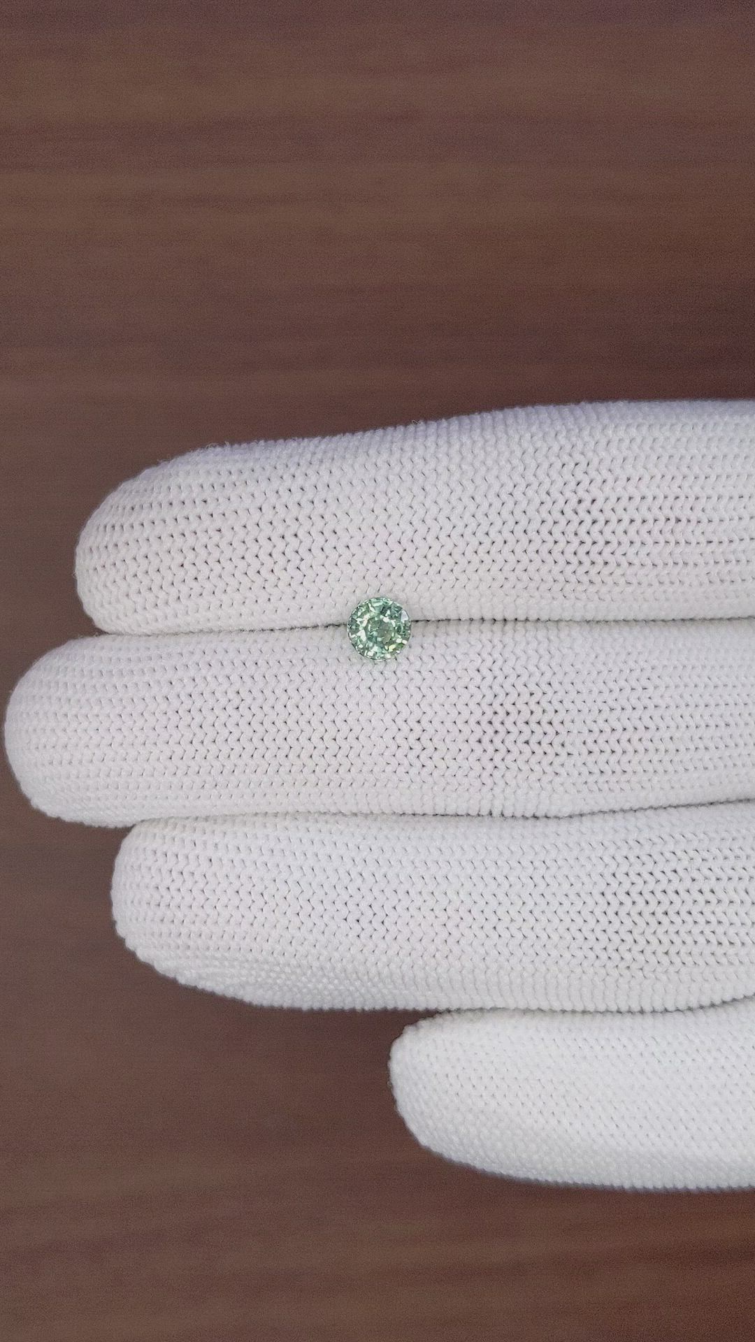 0.98 Ct. Yellowish Green Sapphire from Madagascar Size Video