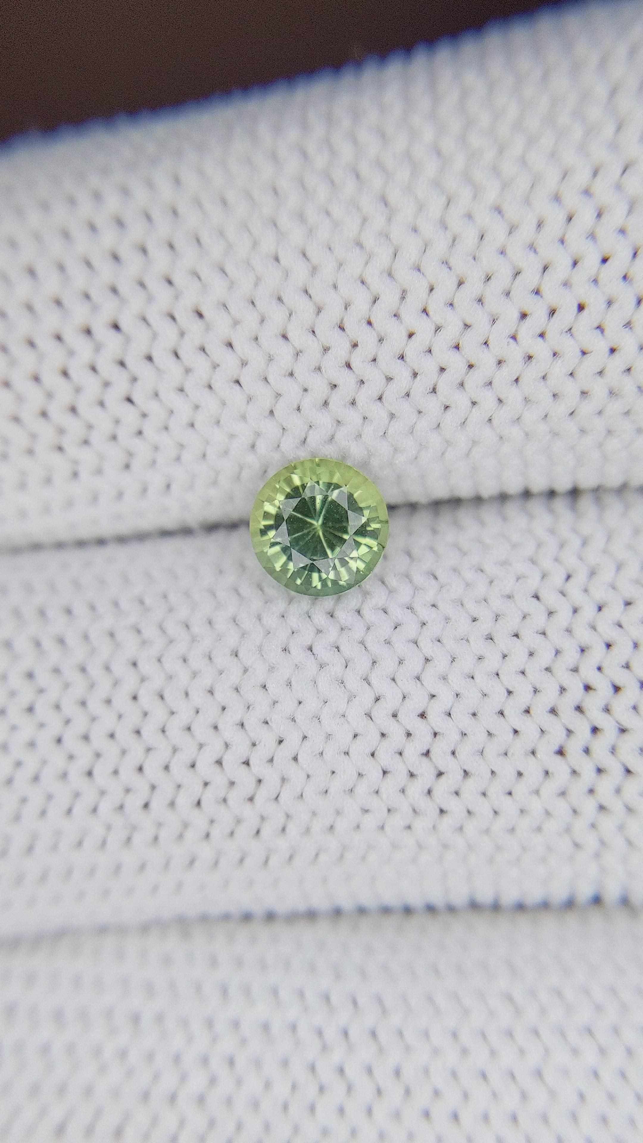 0.92 Ct. Yellowish Green Sapphire from Madagascar Size Video