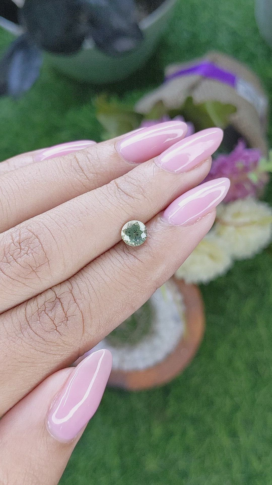 0.92 Ct. Yellowish Green Sapphire from Madagascar Size Video