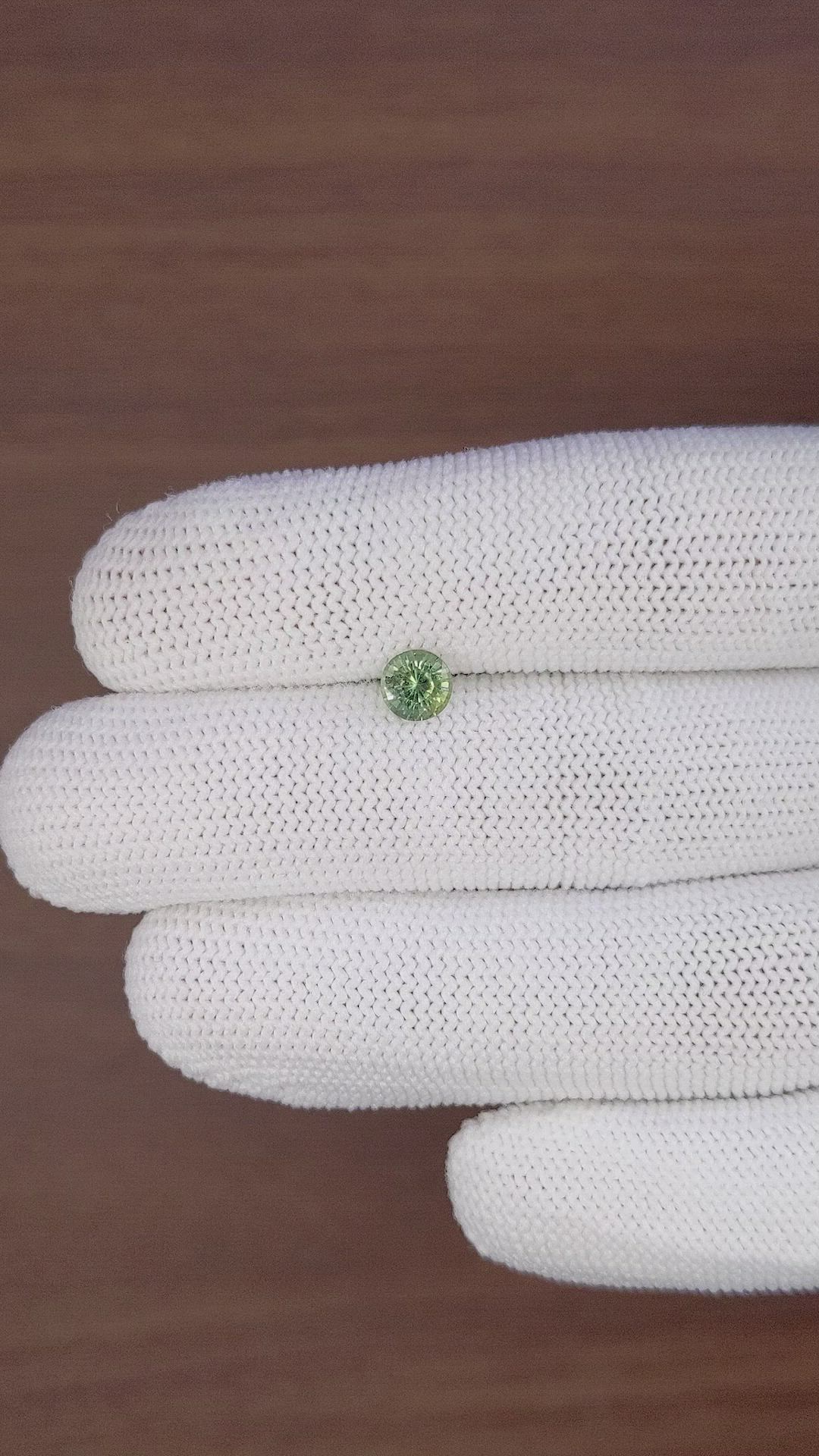 0.91 Ct. Yellowish Green Sapphire from Madagascar Size Video
