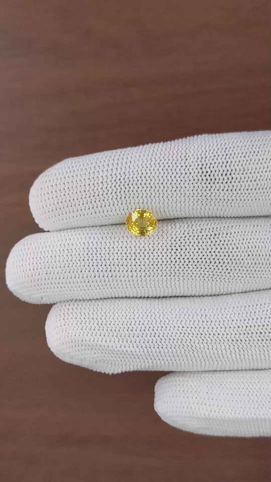 1.52 Ct. Orangish Yellow Sapphire from Ceylon (Sri Lanka) Size Video