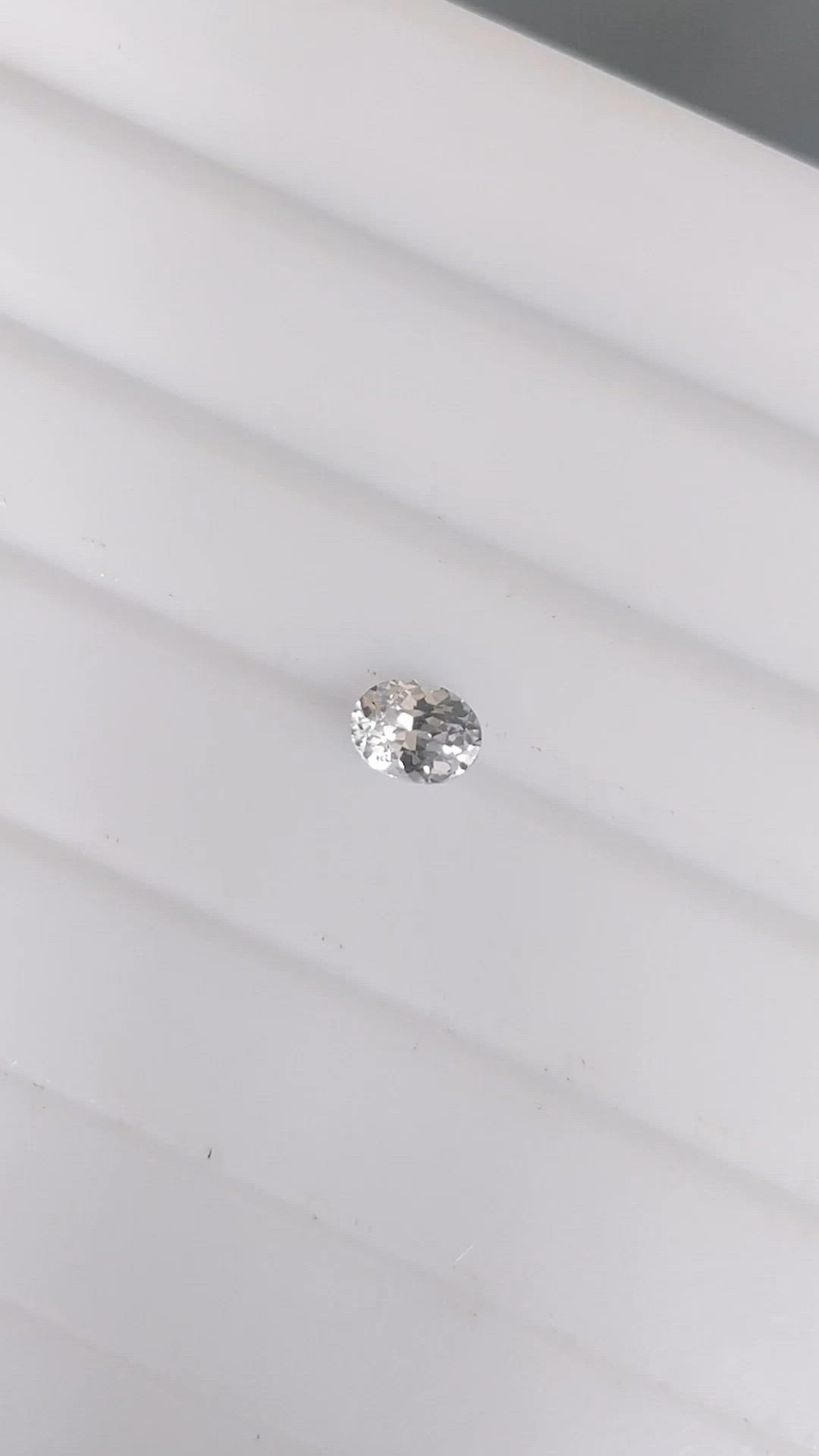 0.69 Ct. White Sapphire from Ceylon (Sri Lanka) Size Video