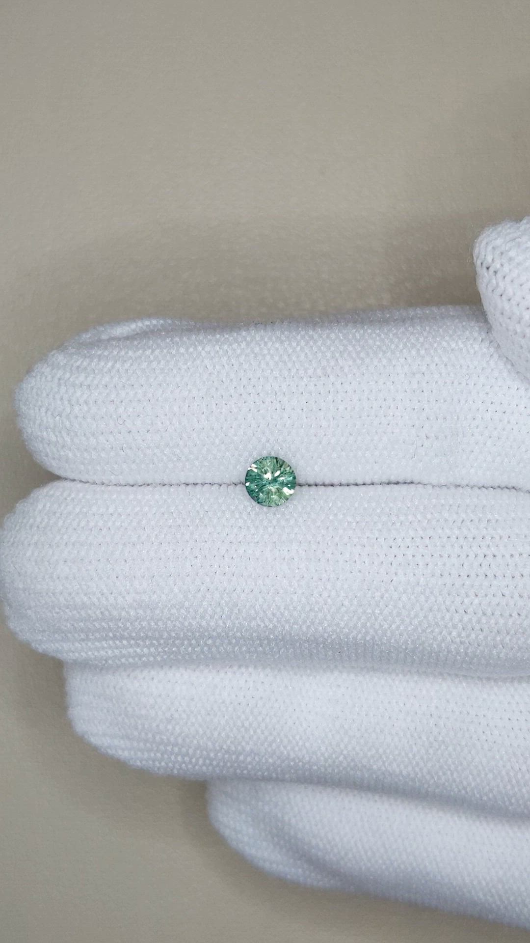 0.42 Ct. Bluish Green Sapphire from Montana Size Video