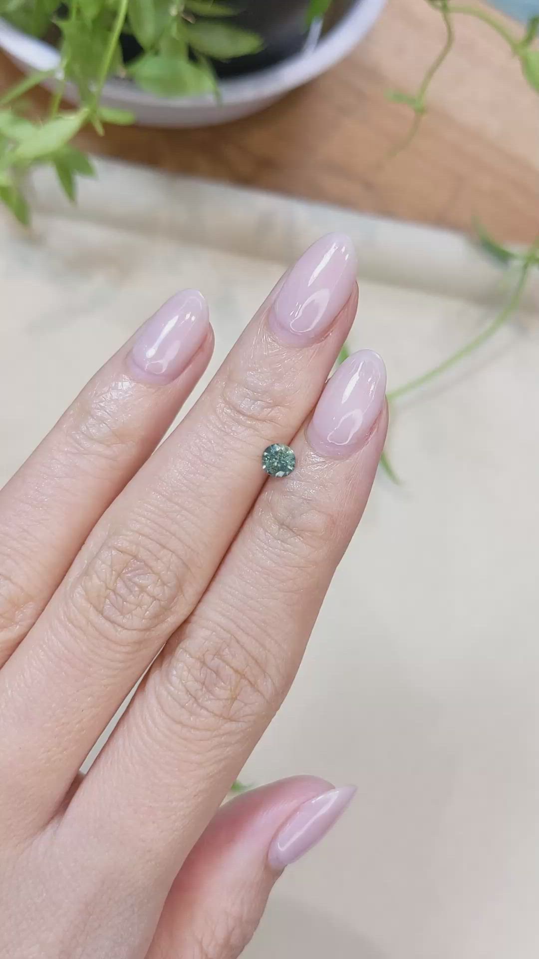0.42 Ct. Bluish Green Sapphire from Montana Size Video