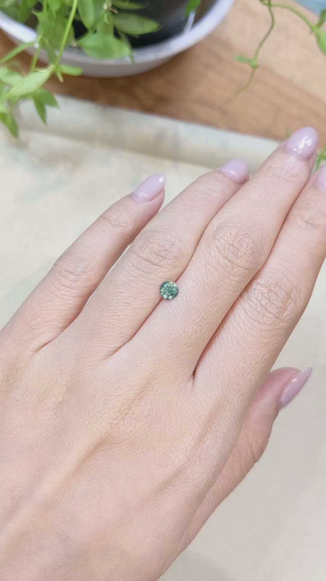 0.42 Ct. Bluish Green Sapphire from Montana Size Video