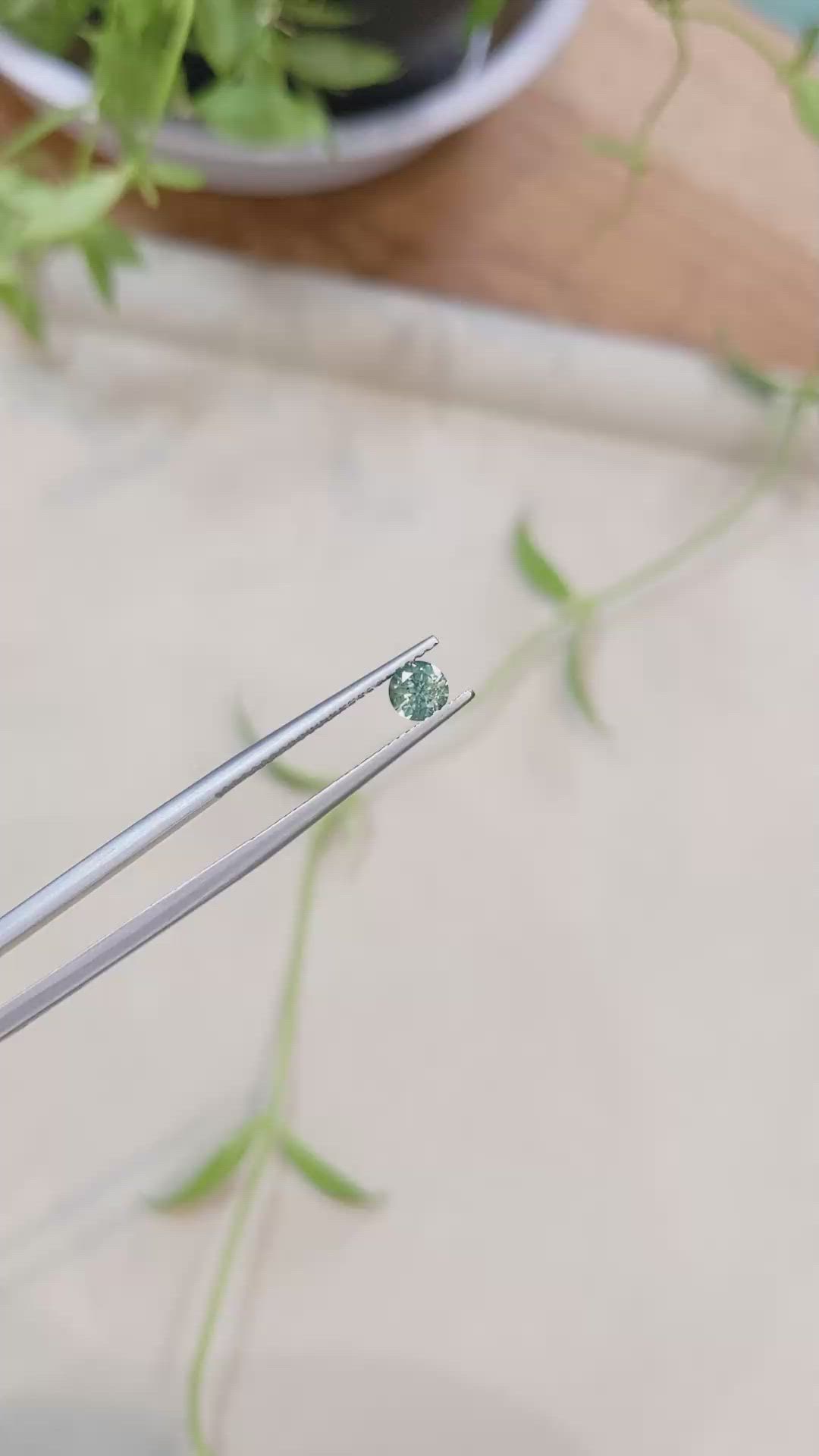 0.42 Ct. Bluish Green Sapphire from Montana Size Video