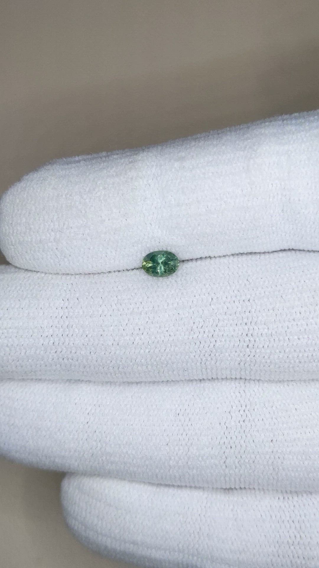 0.46 Ct. Yellowish Green Sapphire from Montana Size Video