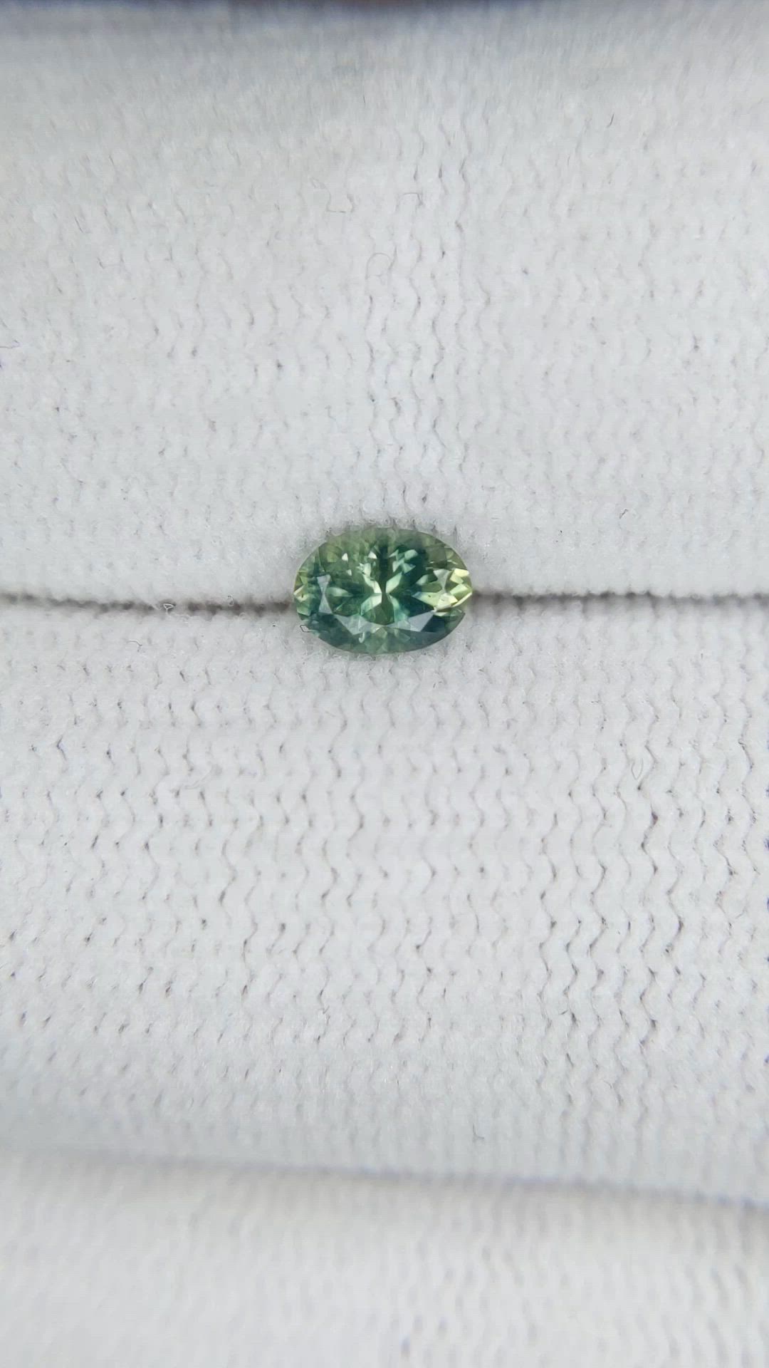 0.46 Ct. Yellowish Green Sapphire from Montana Size Video