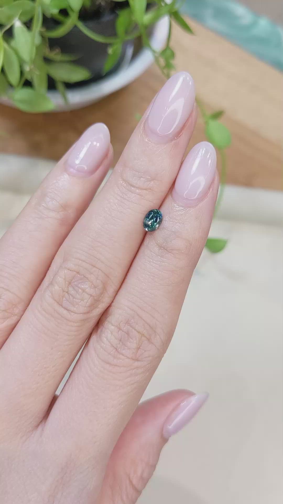 0.47 Ct. Bluish Green Sapphire from Montana Size Video