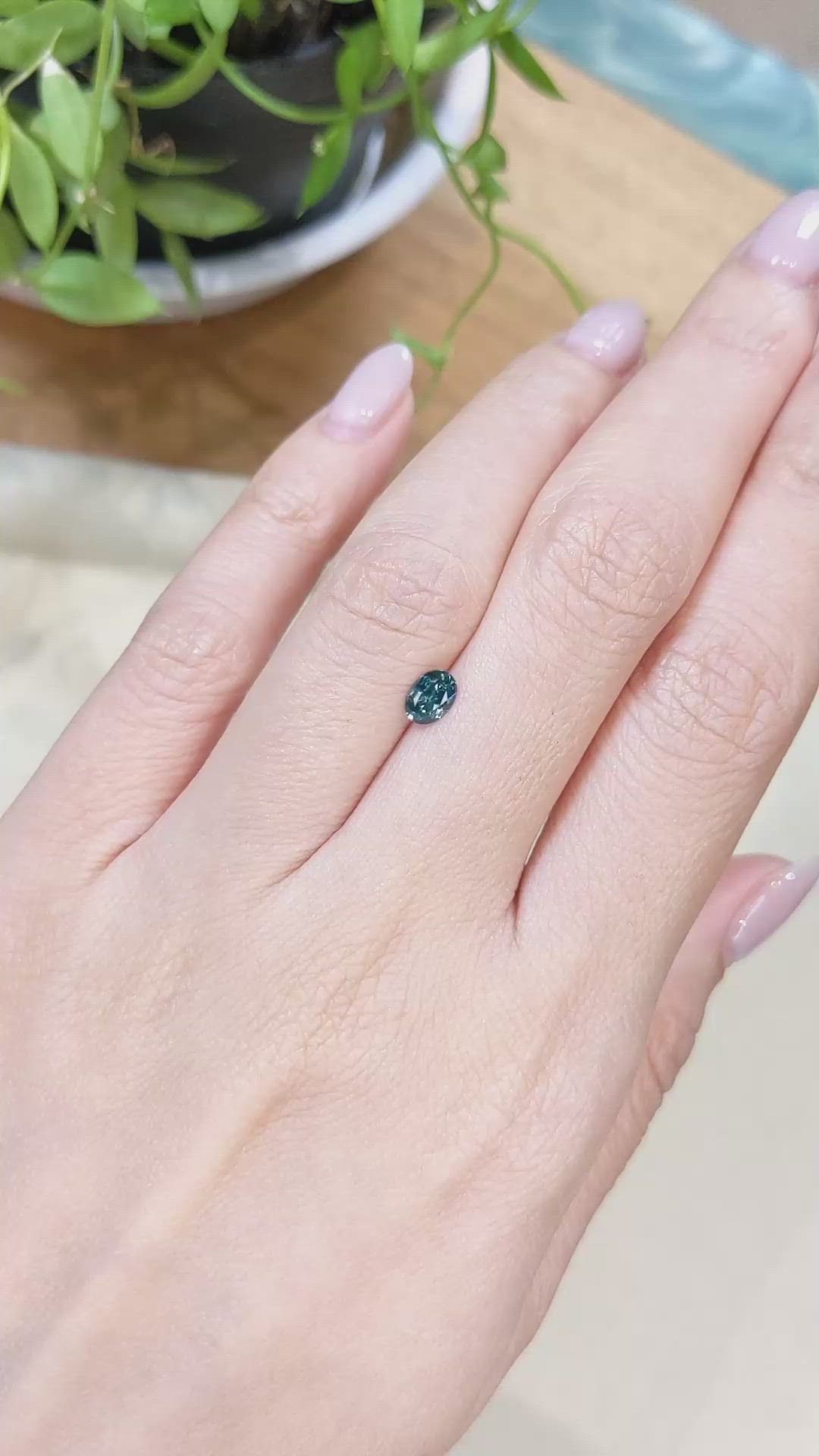 0.47 Ct. Bluish Green Sapphire from Montana Size Video